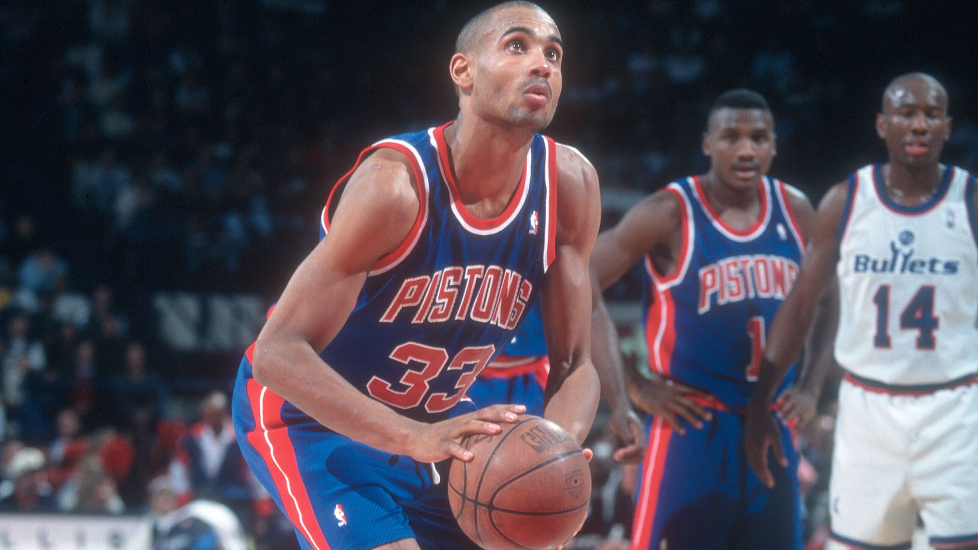 Grant Hill #33 of the Detroit Pistons stands at the line to shoot a foul shot against the Washington Bullets during an NBA basketball game circa 1994 at the US Airways Arena in Landover, Maryland. Hill played for the Pistons from 1994-2000.