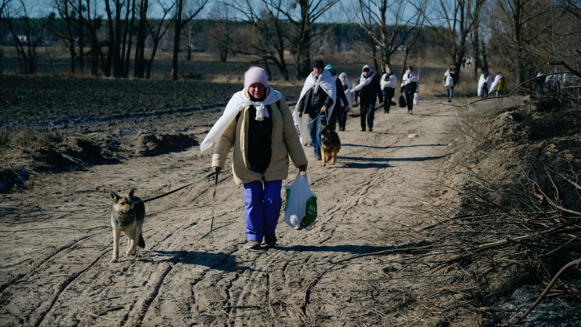 Locals from village Chervone, occupied by Russian troops, evacuate to an area controlled by Ukrainian forces, amid Russia's invasion of Ukraine, near Vyshgorod, Ukraine March 10, 2022.