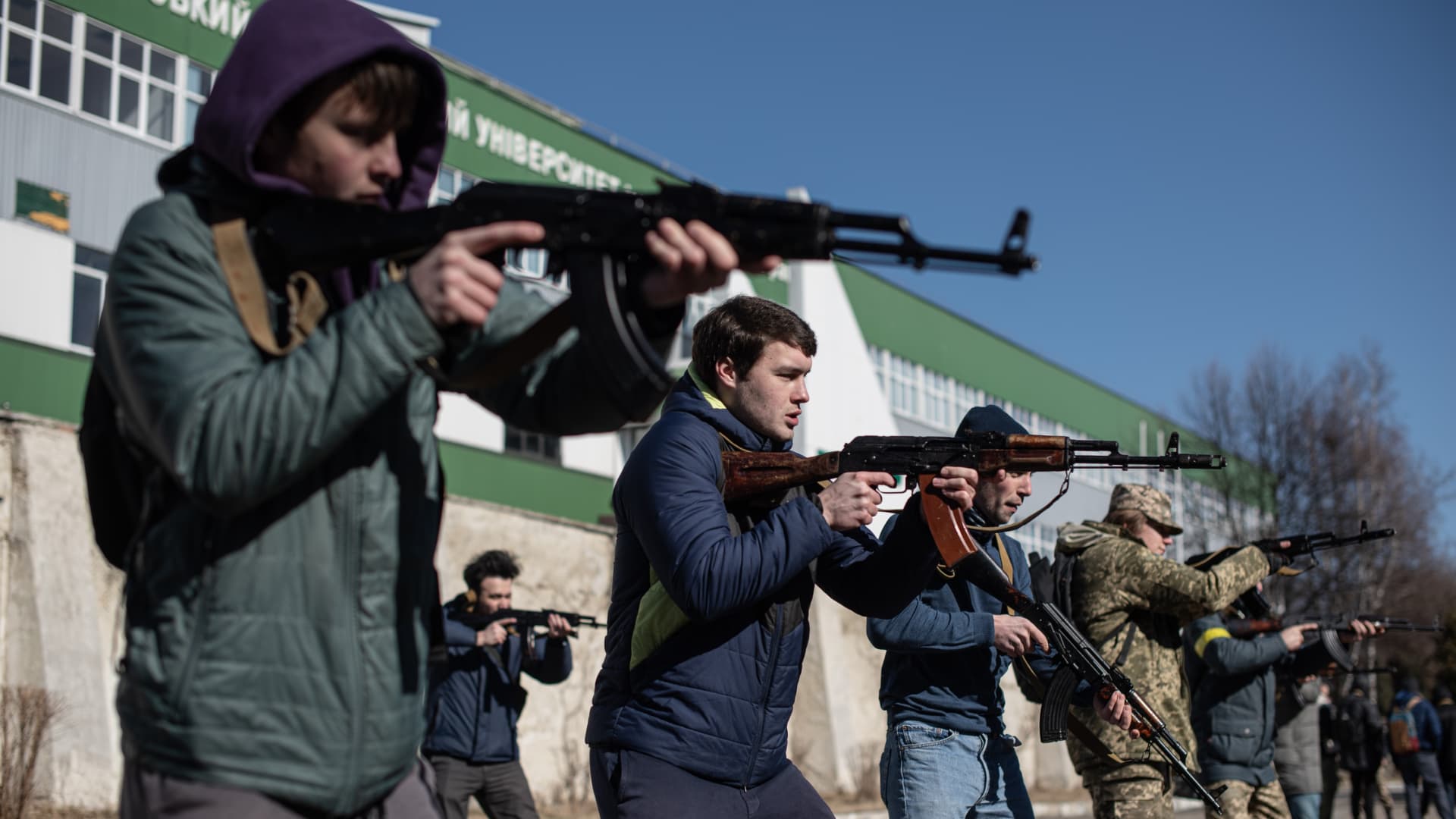 Civilians practice how to handle a firearm at a military training exercise conducted by the Prosvita society in Ivano-Frankivsk, Ukraine, on March 11, 2022.