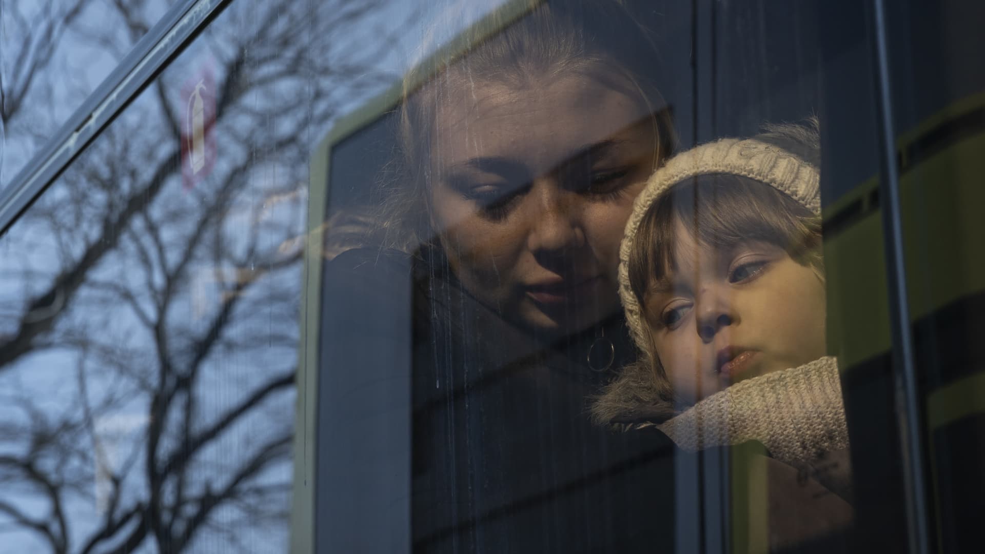 Families board buses to the border with Poland on March 12, 2022 in Lviv, Ukraine.