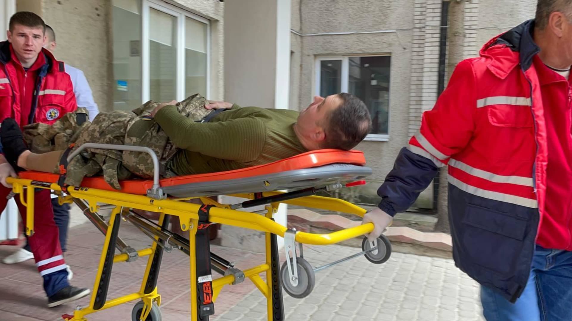 Wounded person is being carried to a hospital after a series of Russian missiles hit the International Center for Peacekeeping and Security this morning in Lviv, Ukraine on March 13, 2022.
