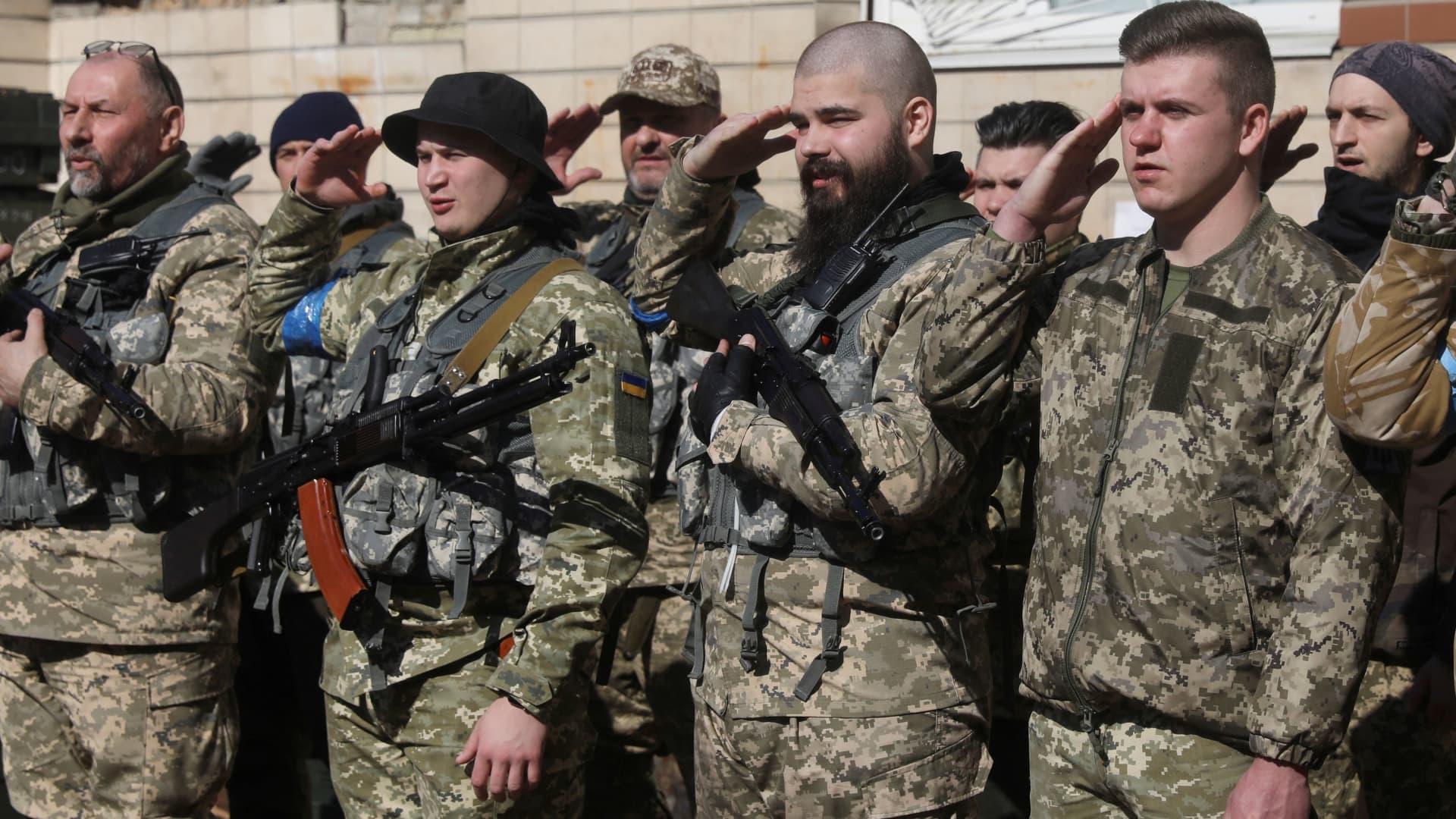 Members of the Ukrainian Territorial Defense Forces take an oath to defend the country, as Russia's invasion of Ukraine continues, in Kyiv, Ukraine March 14, 2022.