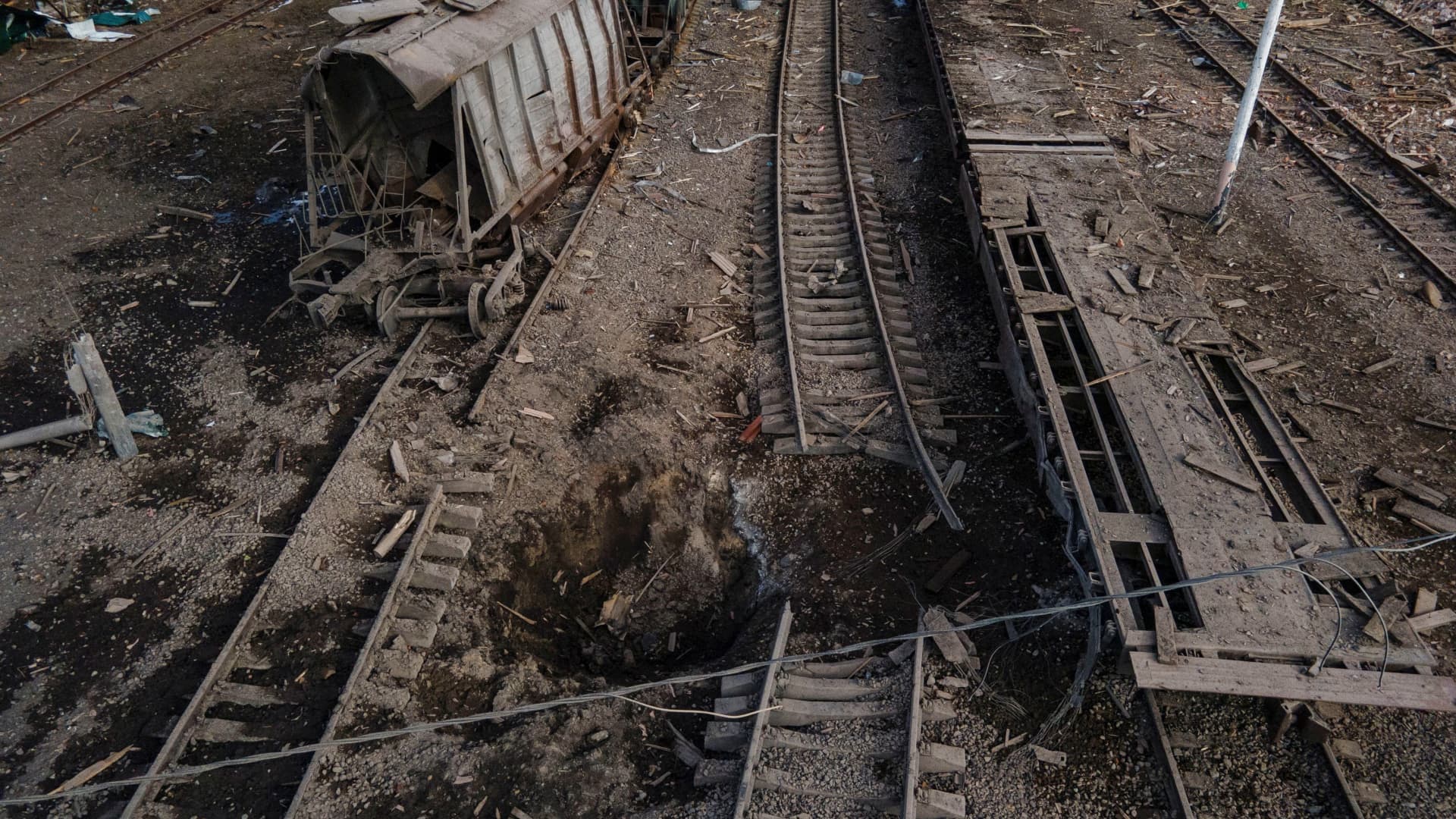 A view shows a bomb crater after an air strike, as Russia's attack on Ukraine continues, at a railway station in the town of Okhtyrka, in the Sumy region, Ukraine March 14, 2022.