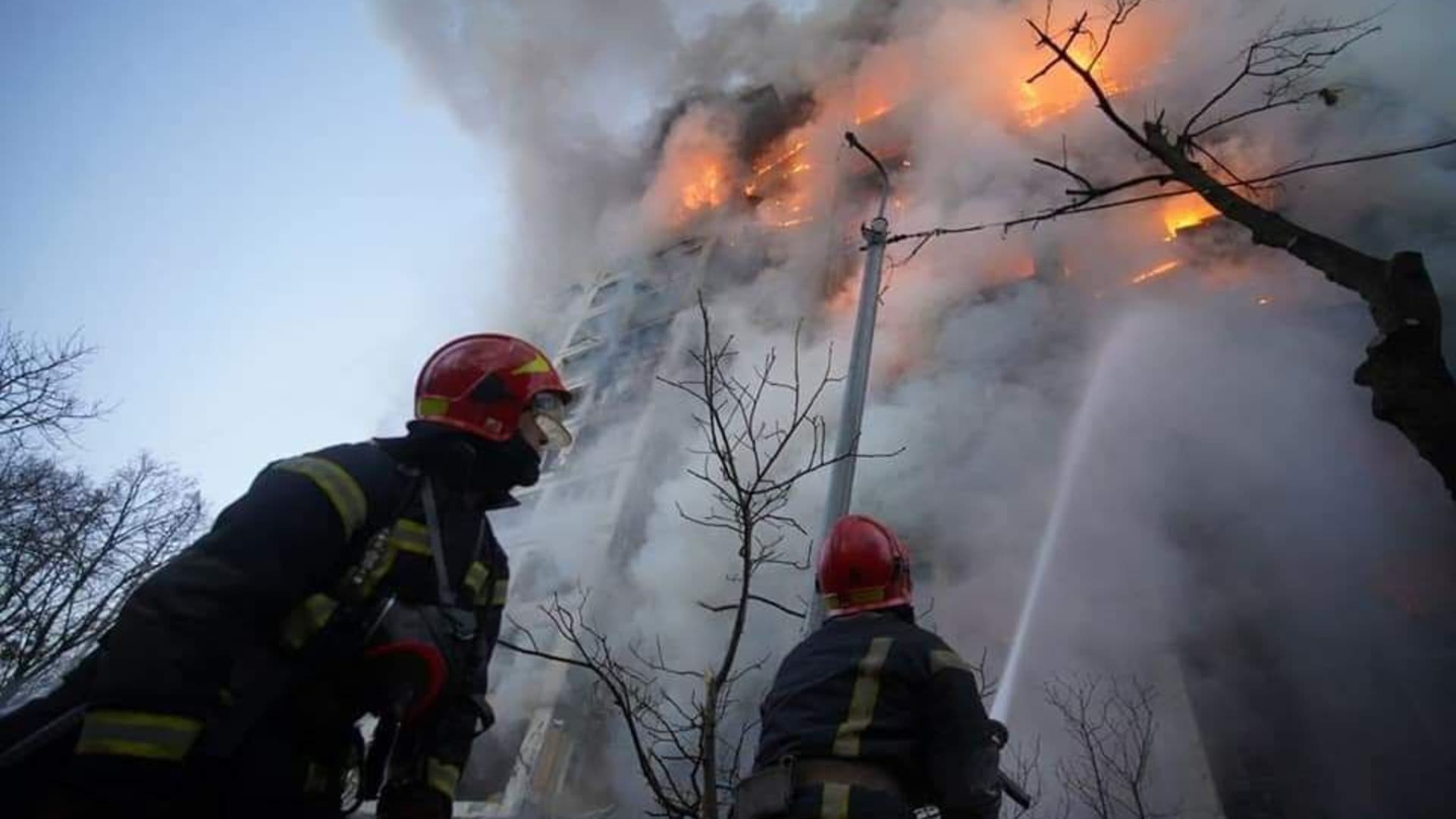 Firefighters try to extinguish a fire after a residential building hit by a Russian attack in Kyiv, Ukraine on March 15, 2022.