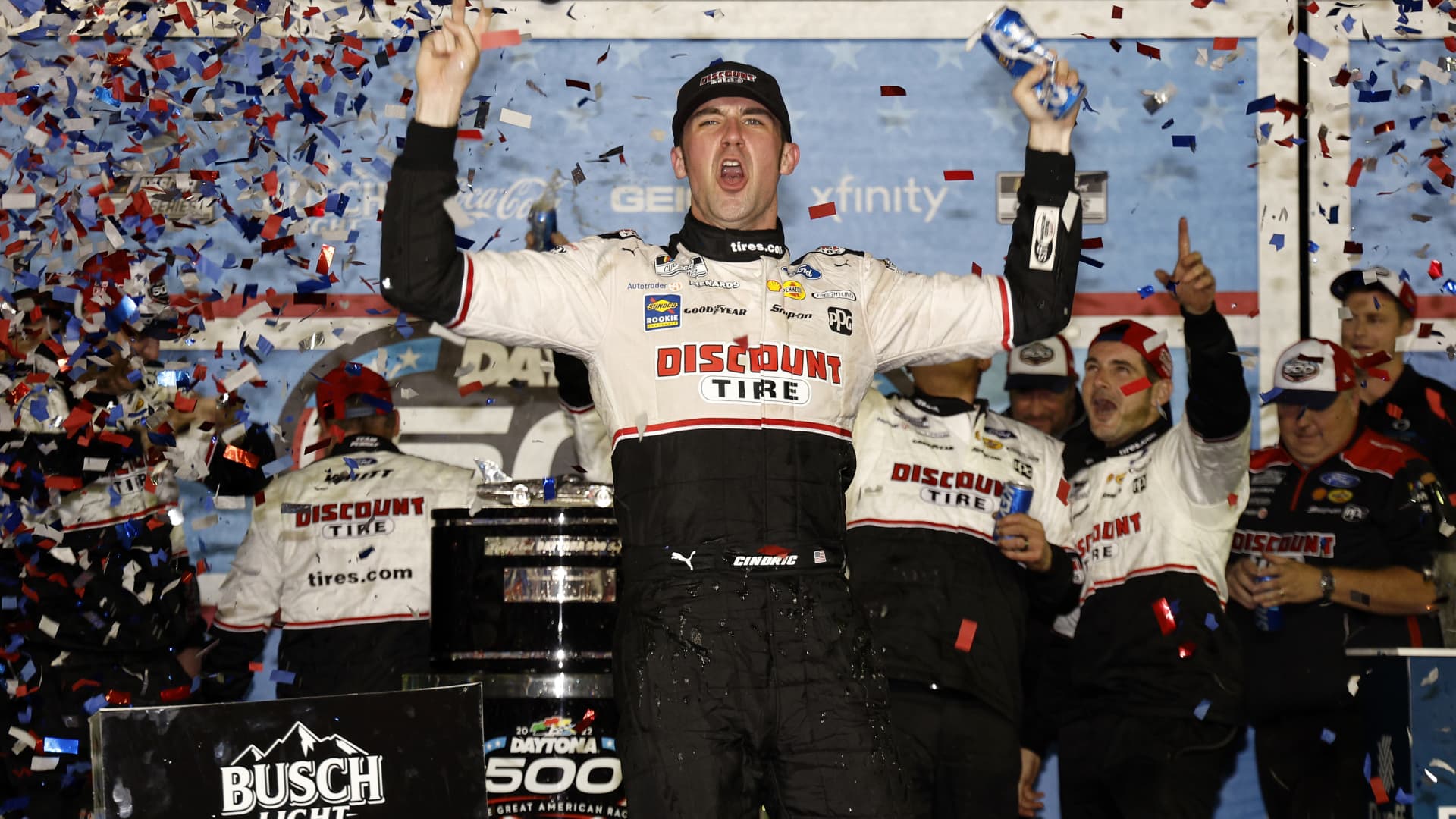 Austin Cindric, driver of the #2 Discount Tire Ford, celebrates in the Ruoff Mortgage victory lane after winning the NASCAR Cup Series 64th Annual Daytona 500 at Daytona International Speedway on February 20, 2022 in Daytona Beach, Florida.