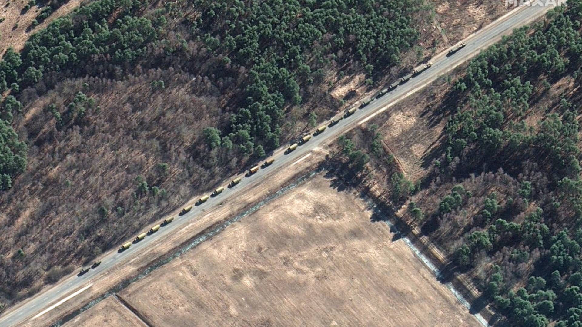 Maxar satellite imagery of mobile bridging unit in convoy on highwayin Southern Belarus.