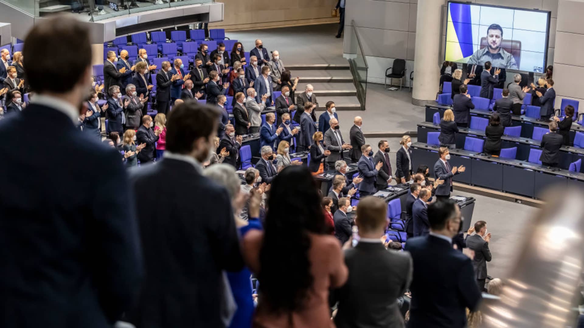 Ukrainian President Volodymyr Zelenskyy receives standing ovations before he addresses the German Bundestag via live video from Kyiv on March 17, 2022.
