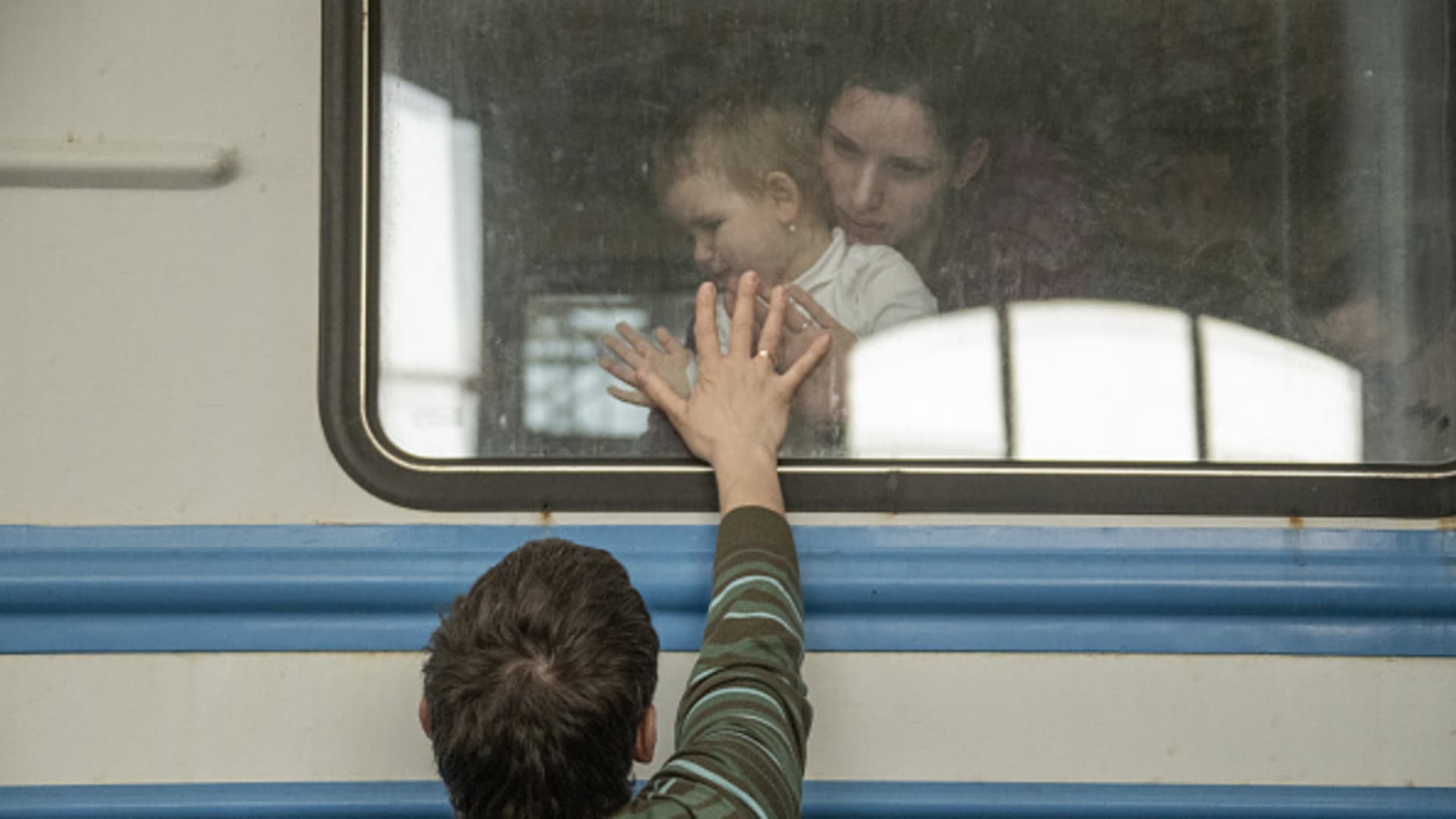 Ukrainian displaced civilians wait in the train station as they flee from the war in Lviv, Ukraine on March 15, 2022.
