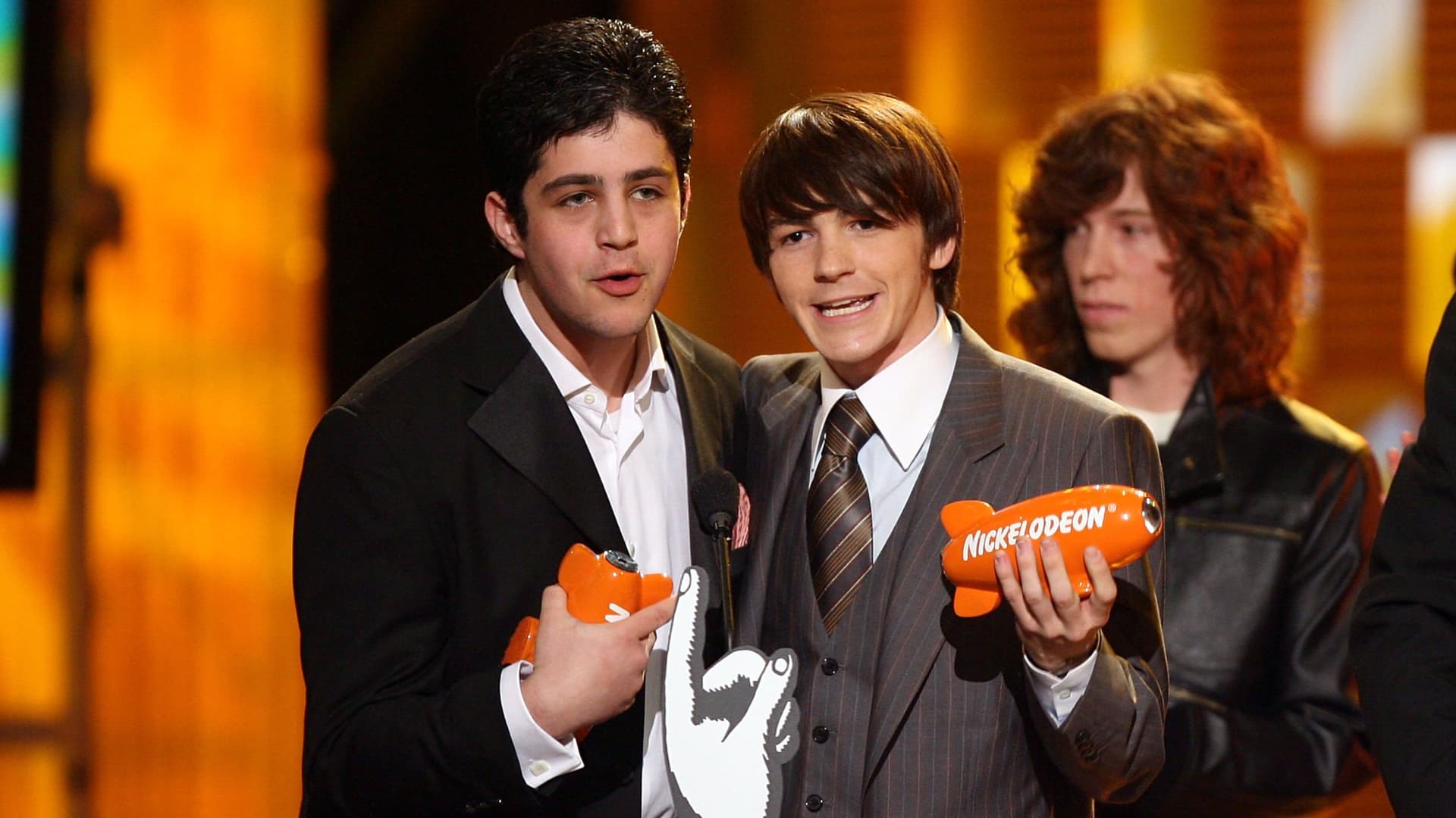 Drake and Josh Peck accept their award for Favorite TV Show from Snowboarder Shaun White onstage at the 19th Annual Kid's Choice Awards held at UCLA's Pauley Pavilion on April 1, 2006 in Westwood, California.
