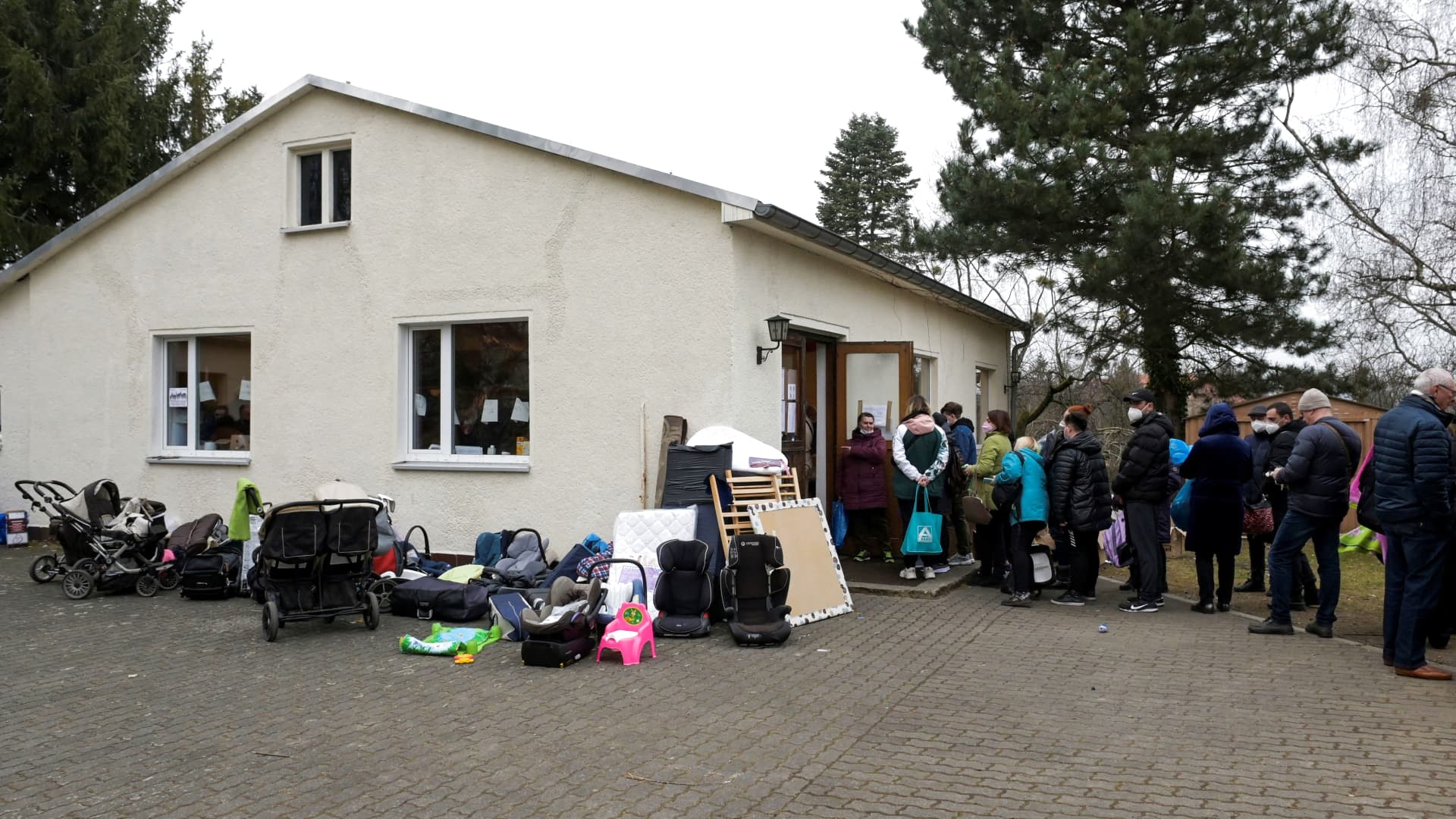 Refugees from Ukraine wait in front of a donation collection point organized by Dresden's Ukraine Catholic parish, amid Russia's invasion of Ukraine, in Dresden, Germany, March 17, 2022.