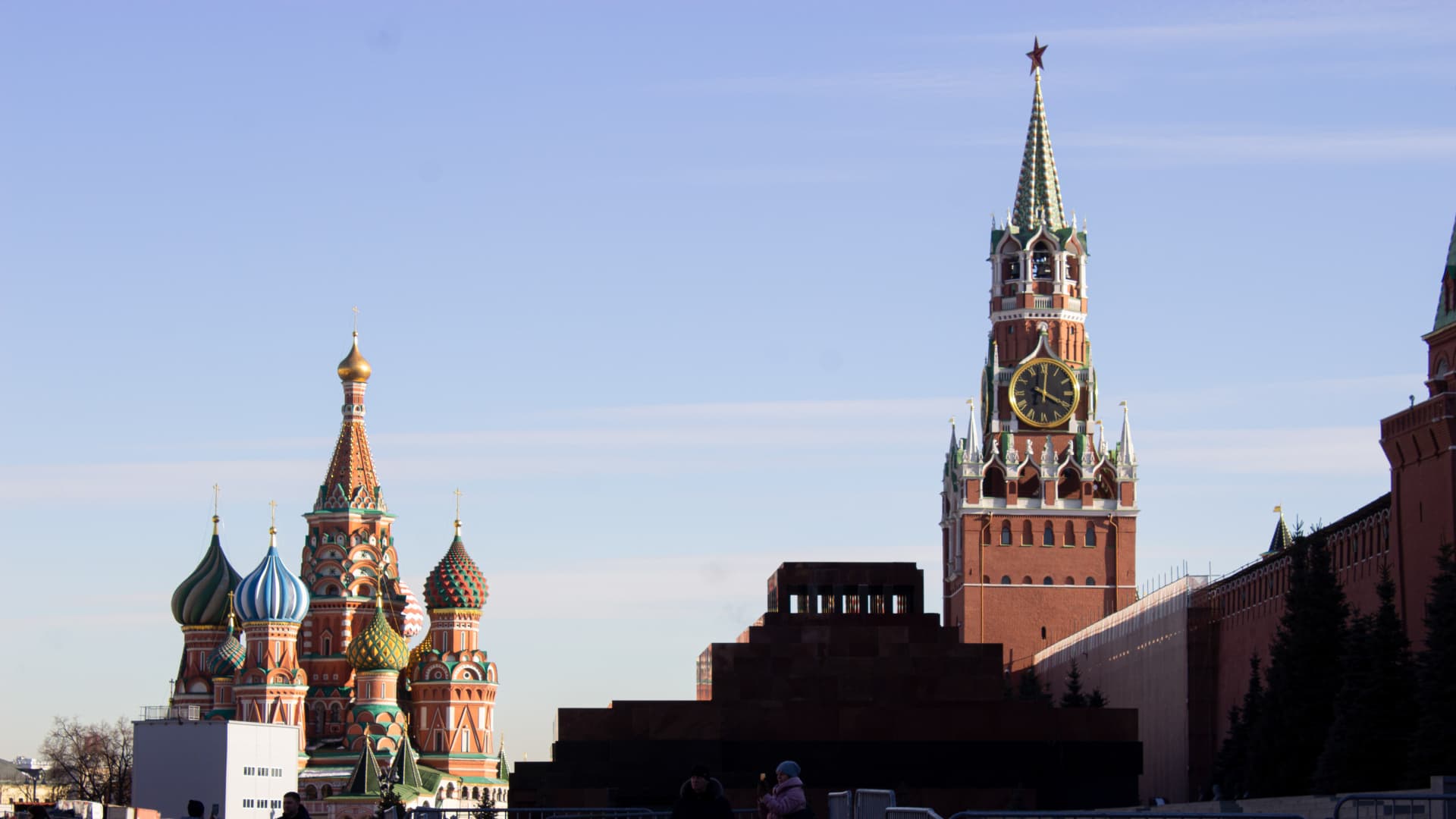 The St. Basil Cathedral and a Kremlin tower are visible on the Red Square in Moscow.