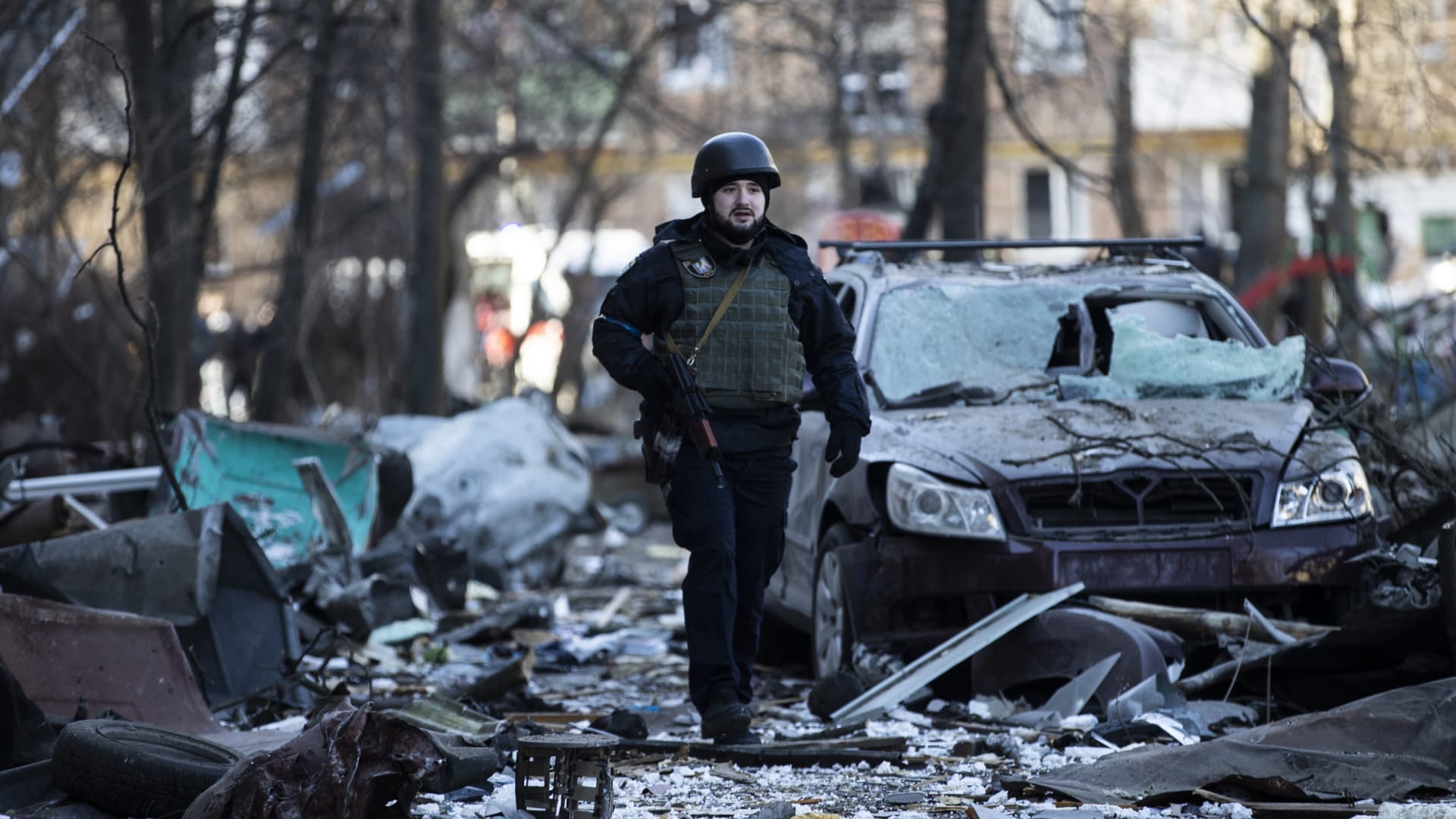 A man walks on a shell-damaged street in Kyiv, Ukraine on March 18, 2022.