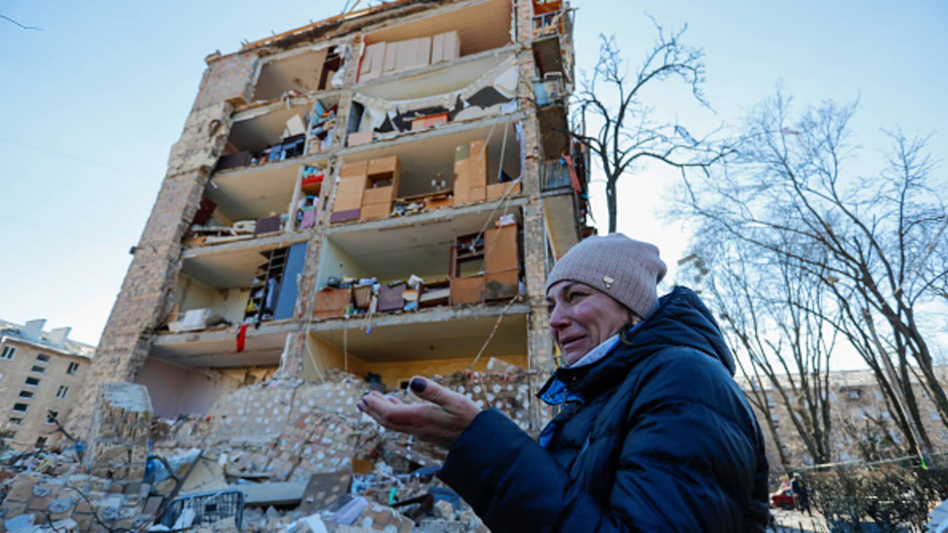 A Ukrainian woman cries outside a destroyed residential building by artillery in a residential area in Kyiv amid Russian Invasion, in Kyiv, Ukraine, 18 March 2022.