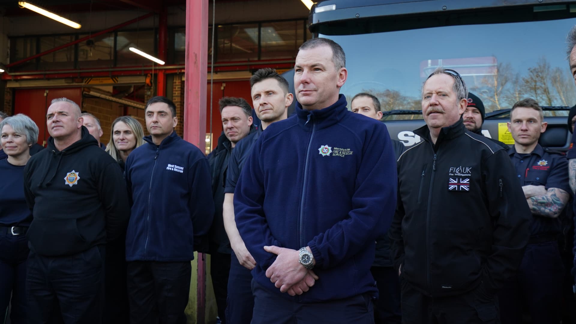 Fire officers at Ashford fire station are briefed prior to setting off from Ashford in Kent, in convoy with donated emergency vehicles and service equipment, organised by Fire AID and the National Fire Chiefs Council, destined for the Polish border with Ukraine. Picture date: Saturday March 19, 2022.