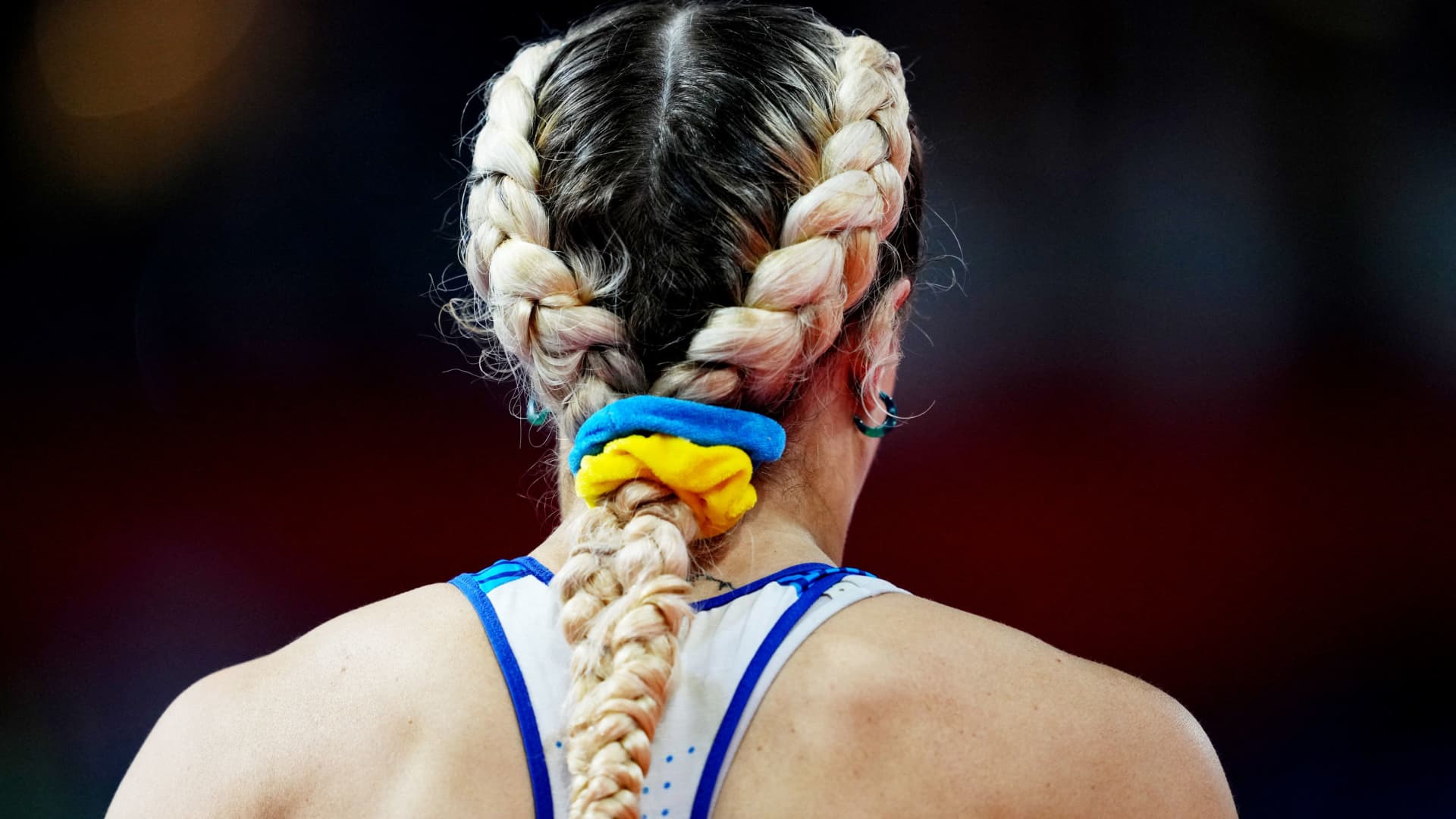 Britain's Megan Marrs wears a Ukraine hair band in support amid Russia's invasion during the women's 60 meters hurdles heat 1 .