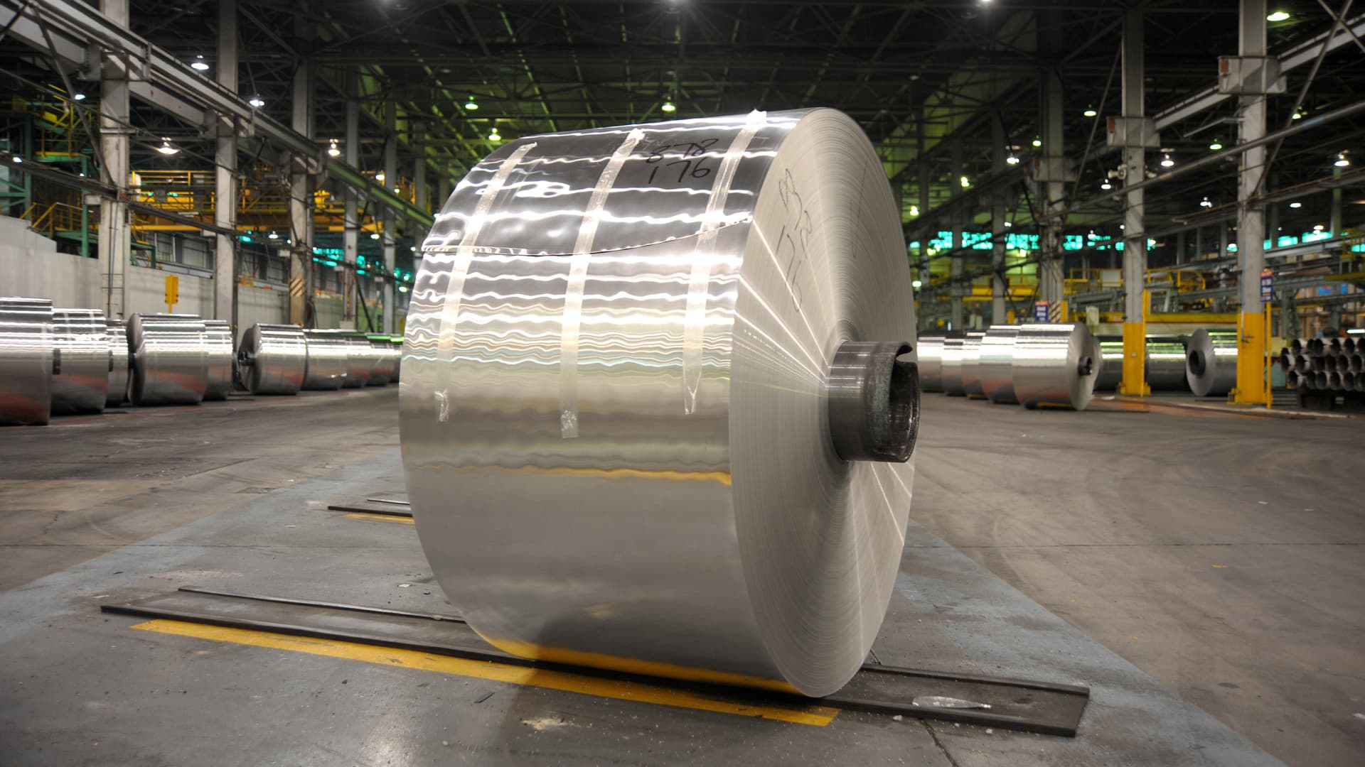 An aluminum coil stands in a warehouse awaiting transport, at an Alcoa World Alumina Australia smelting plant, partially owned by Alumina Ltd., in Point Henry, Australia.