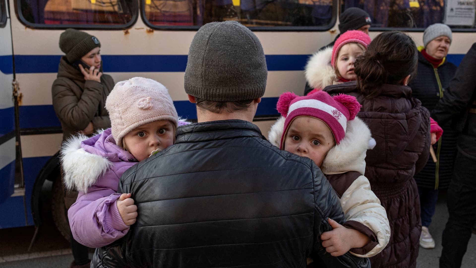 Evacuees from the villages occupied by Russian soldiers arrive in the town of Brovary, amid Russia's invasion of Ukraine, near Kyiv, Ukraine, March 20, 2022.
