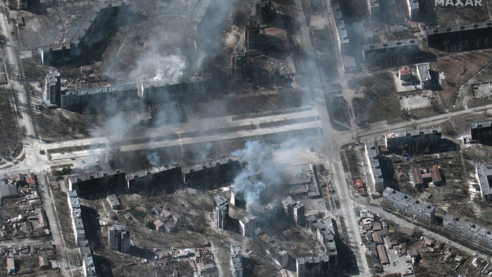 Maxar satellite image of additional burning residential apartment buildings in Mariupol, Ukraine.