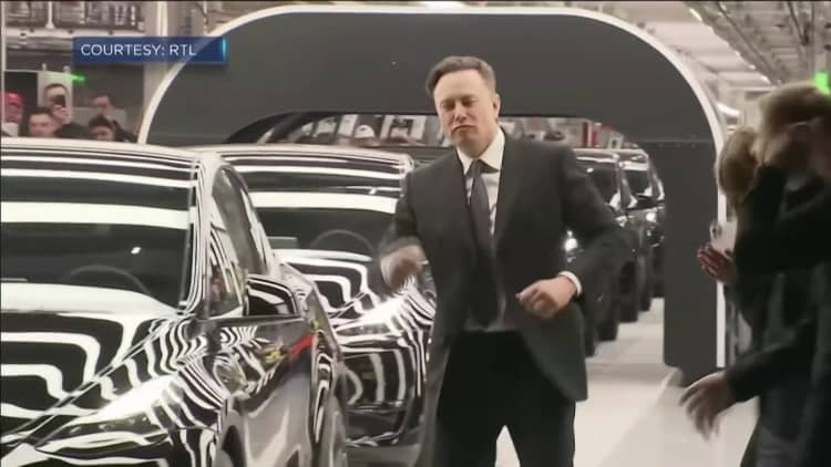 Elon Musk dances at the opening of Tesla's new factory in Germany
