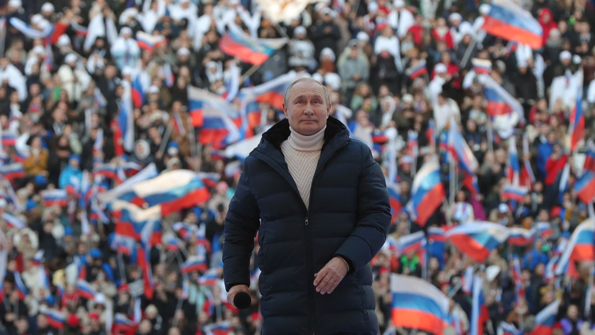 Russian President Vladimir Putin attends a concert marking the eighth anniversary of Russia's annexation of Crimea from Ukraine at the Luzhniki stadium in Moscow on March 18, 2022.