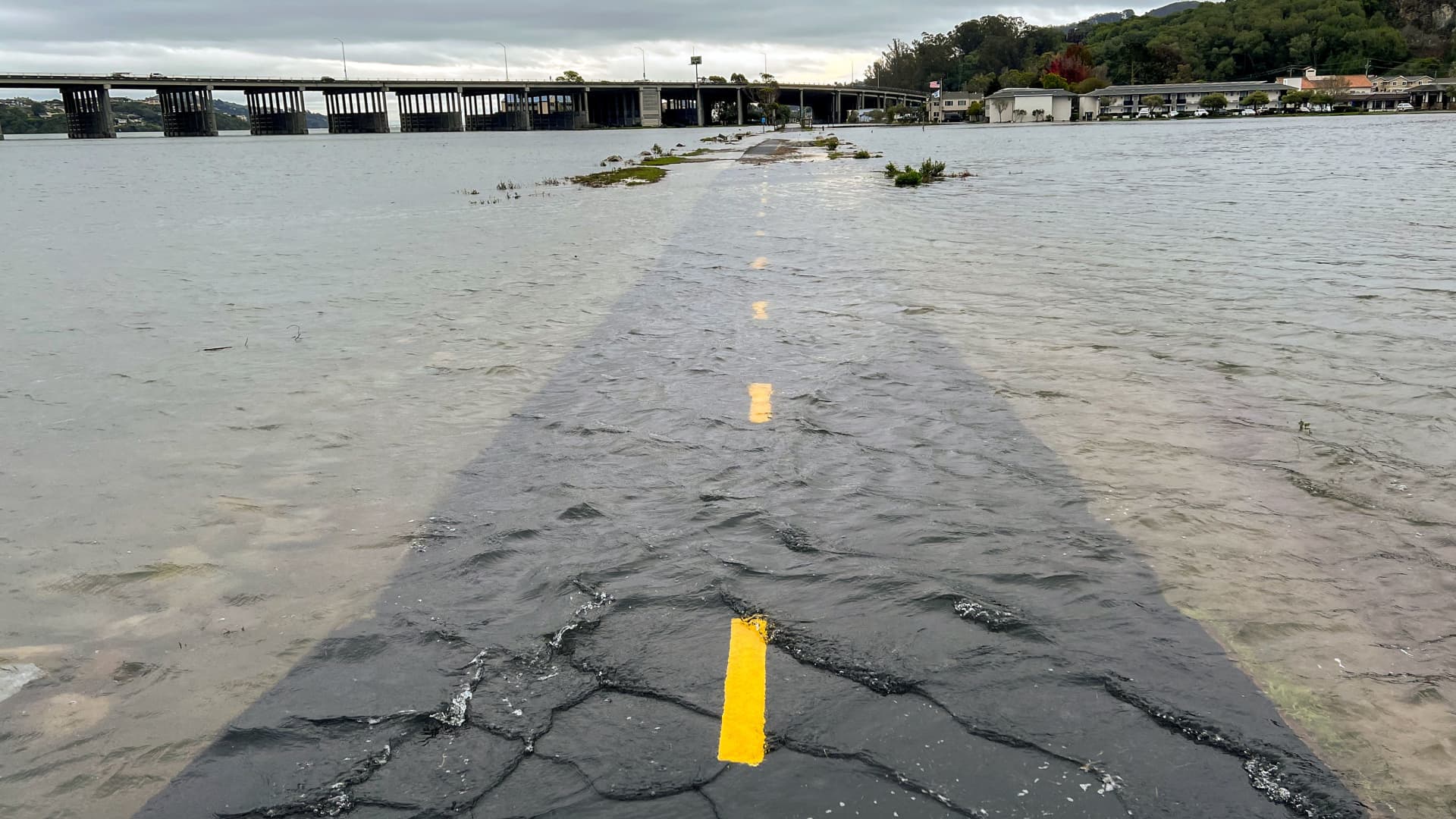 A section of the Sausalito/Mill Valley bike path is seen covered in ocean water in Mill Valley, California, on Jan. 3, 2022.