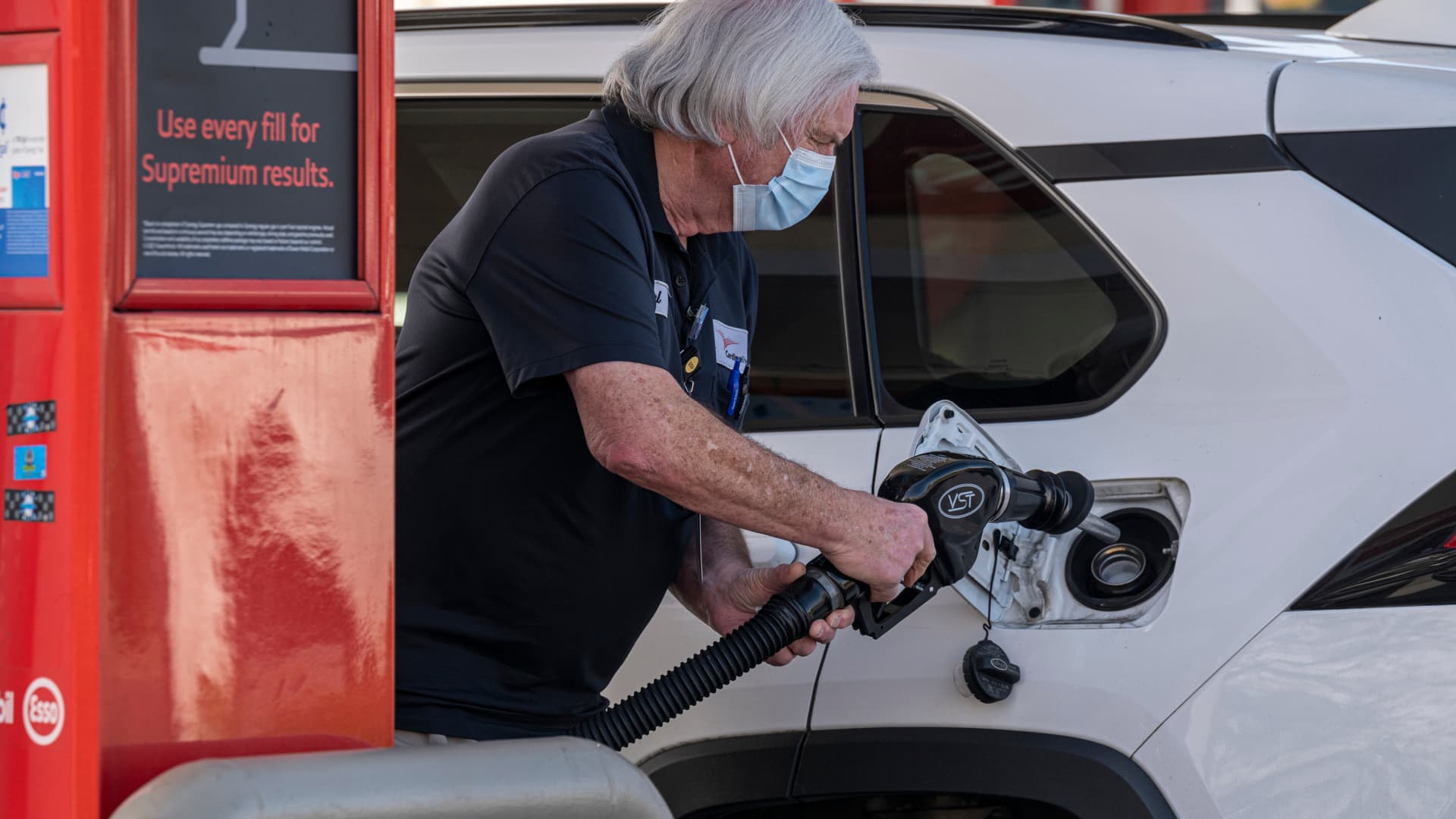 A driver fuels a vehicle a gas station in Richmond, California, on March 24, 2022.