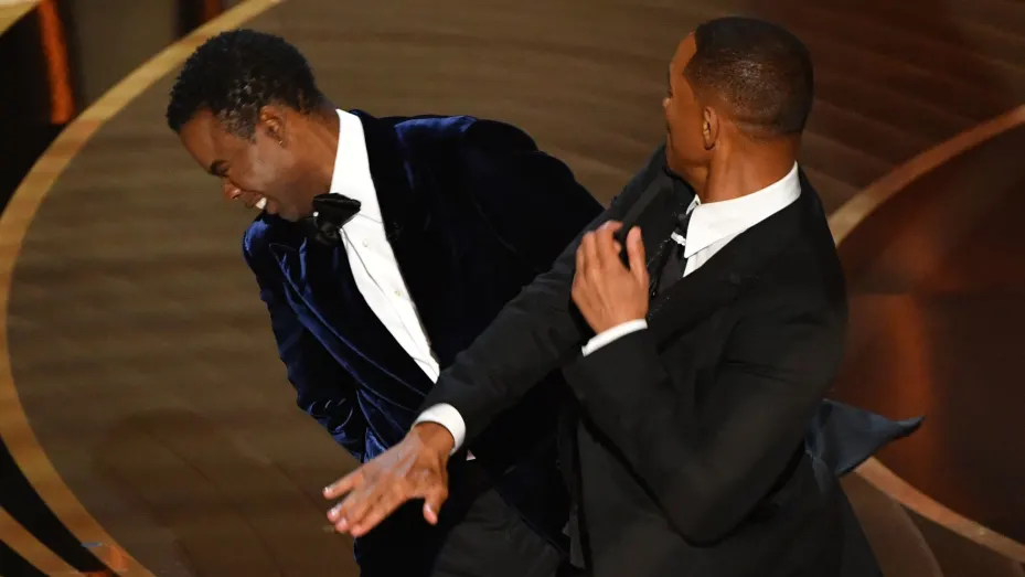 Will Smith slaps actor Chris Rock onstage during the 94th Oscars at the Dolby Theatre in Hollywood, California on March 27, 2022.