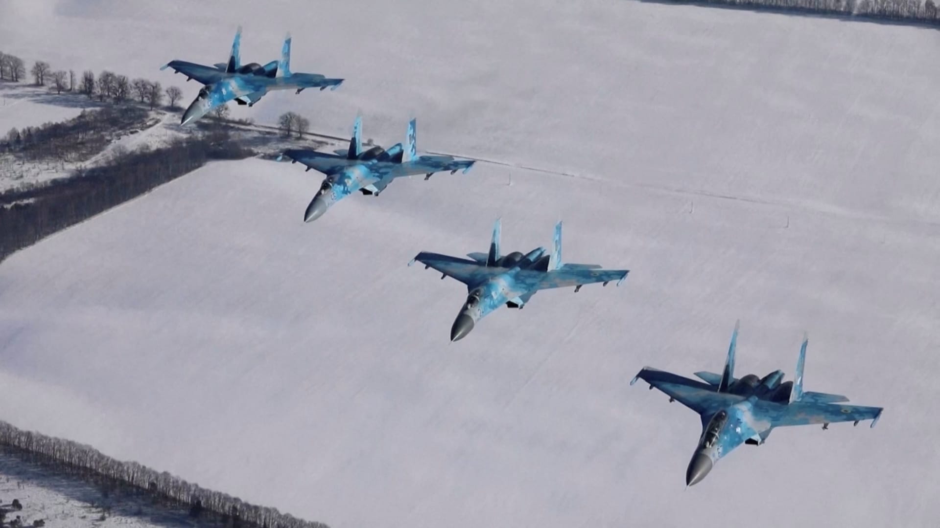 Ukrainian Air Force aircrafts flyduring drills over an unidentified location in Ukraine in this screen grab from an undated handout video.