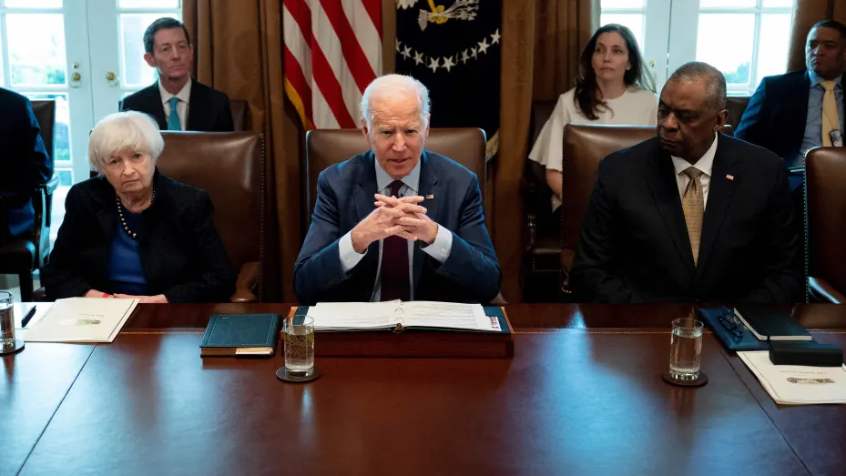 US President Joe Biden, with Treasury Secretary Janet Yellen (L) and Defense Secretary Lloyd Austin (R), speaks during a meeting with his cabinet at the White House in Washington, DC, on March 3, 2022.
