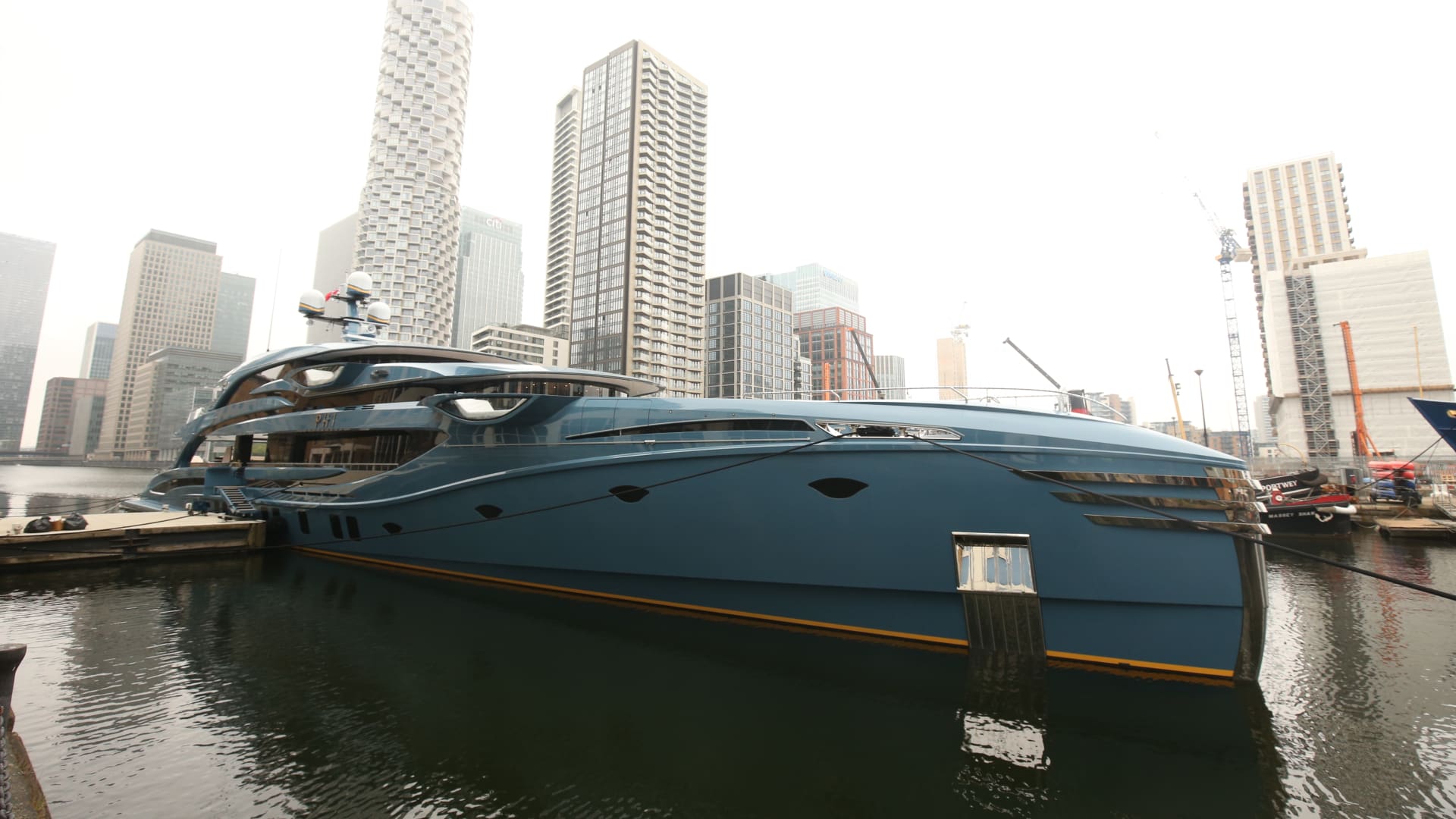 The superyacht Phi owned by a Russian businessman in Canary Wharf, east London which has been detained as part of sanctions against Russia.