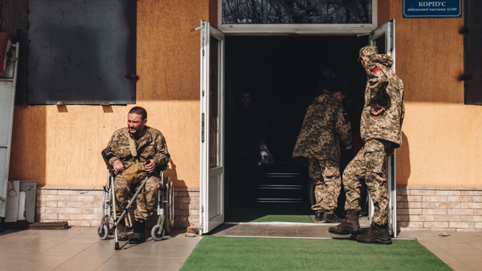 Zaporizhzhya, UKRAINE - MARCH 30:A wounded soldier waits outside a hospital in Zaporizhzhya, Ukraine, 30 March 2022. (Photo by Diego Herrera Carcedo/Anadolu Agency via Getty Images)