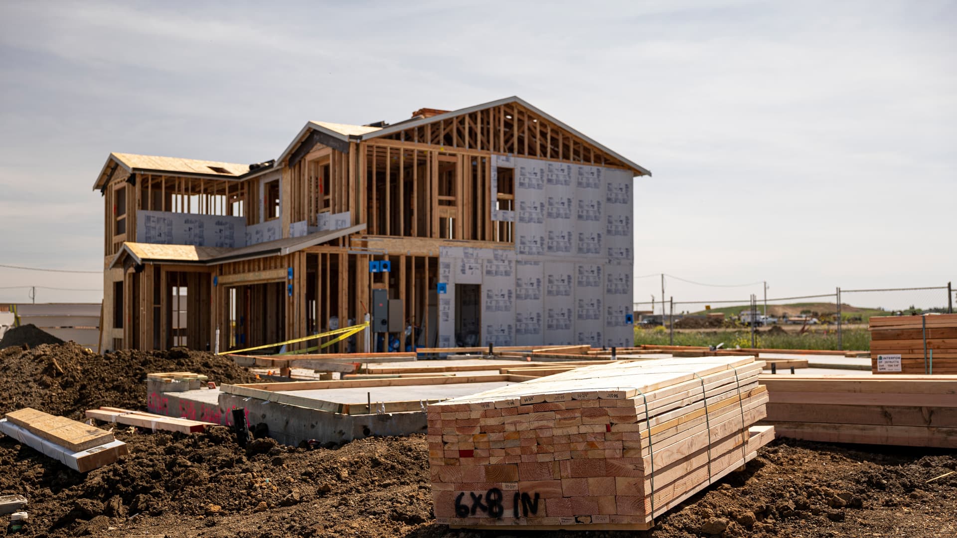 Lumber at the site of a house under construction in the Cielo at Sand Creek by Century Communities housing development in Antioch, California, U.S., on Thursday, March 31, 2022.