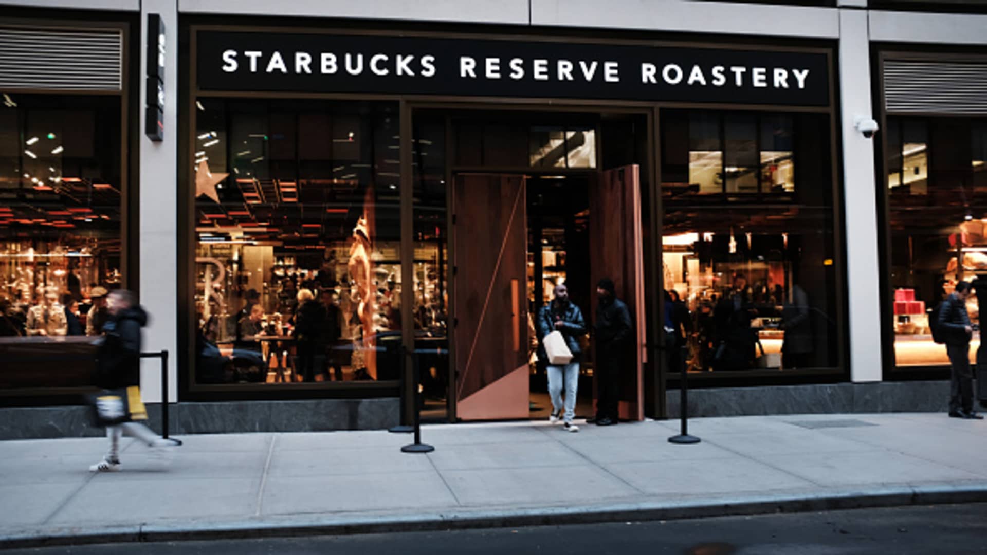 ]People exit a newly opened Starbucks' Reserve Roasteries in the Meatpacking District on on December 14, 2018 in New York City.