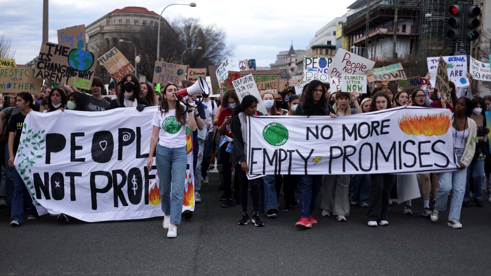 Environmental activists march from Lafayette Square to Capitol Hill during a Fridays Global Climate Strike event on March 25, 2022 in Washington, DC.