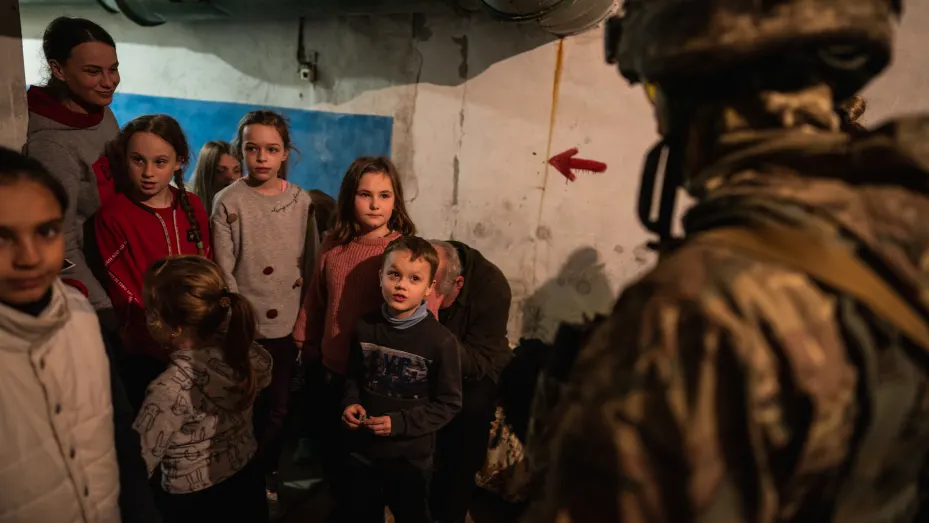 Civilians are seen taking shelter from Russian artillery in the Kharkiv area of Ukraine on April 3, 2022.