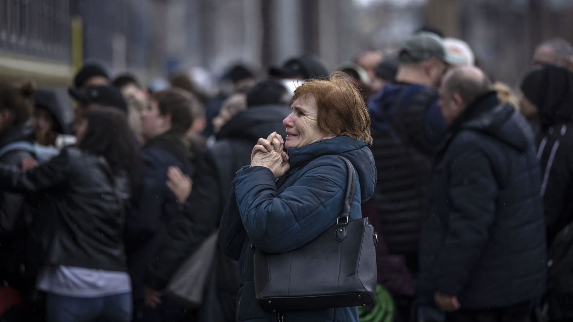 A woman reacts before the train leaves the eastern city of Kramatorsk, in the Donbas region, on April 3, 2022.