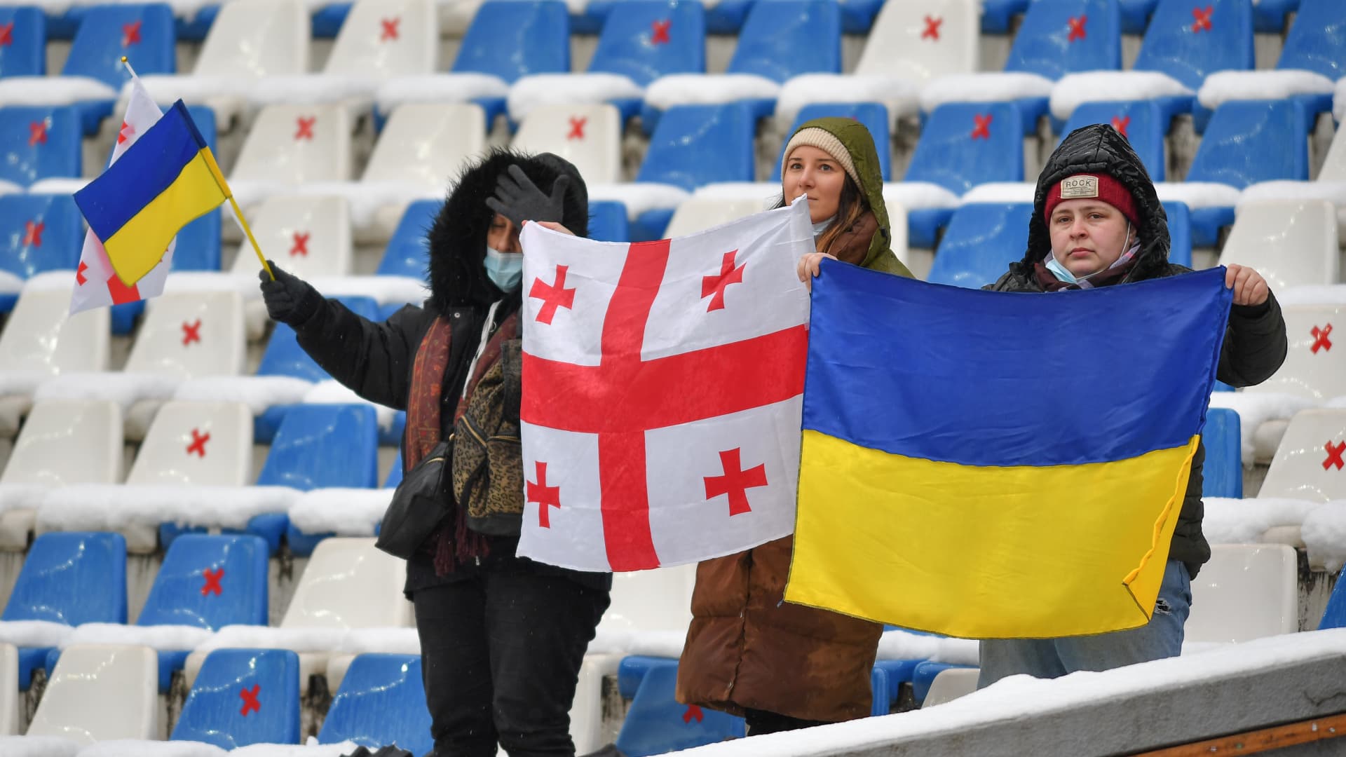 Fans waving the flags of Ukraine and Georgia at a match between Georgia and Spain at the Rugby Europe International Championship on March 20 in Tbilisi, Georgia. Russia fought a war with Georgia in 2008, after which it recognized as independent the breakaway regions of South Ossetia and Abkhazia.
