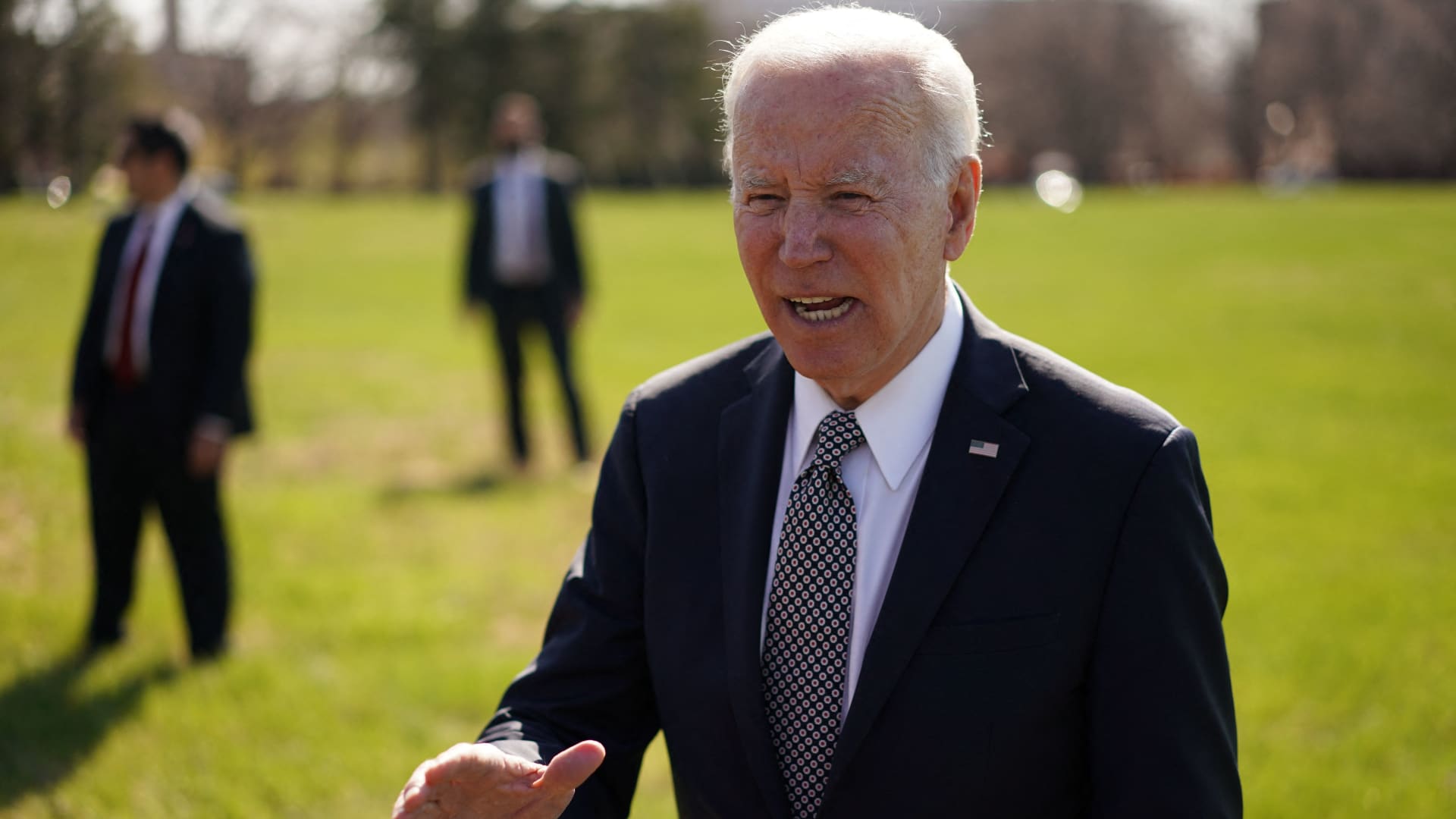 US President Joe Biden speaks to reporters upon arrival at Fort McNair in Washington, DC on April 4, 2022.