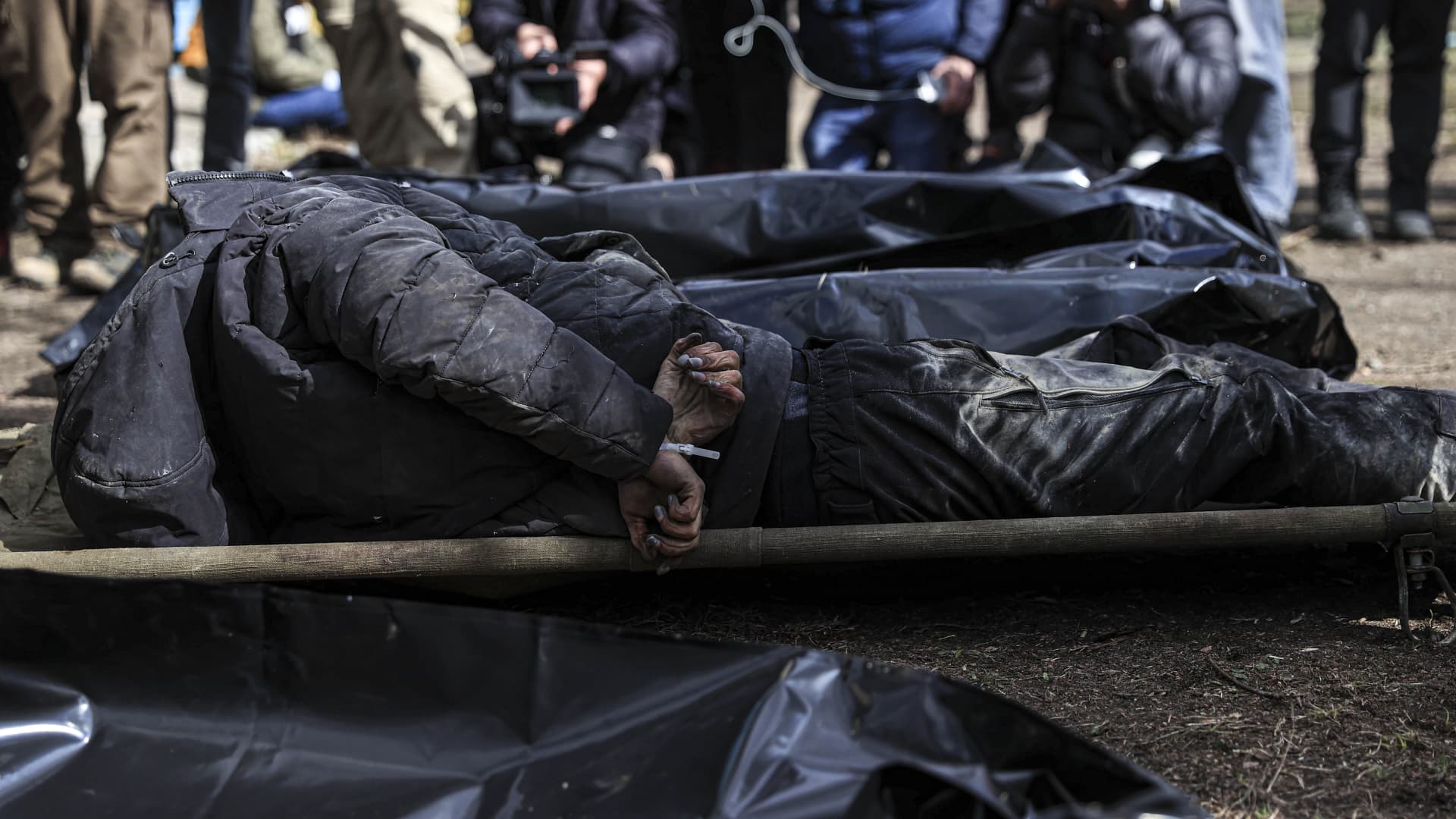 (EDITOR'S NOTE: Image depicts death) Civilians' bodies, which were found dead in the Ukrainian town of Bucha, were gathered to be buried on Monday, on April 4, 2022 in Bucha, Ukraine.