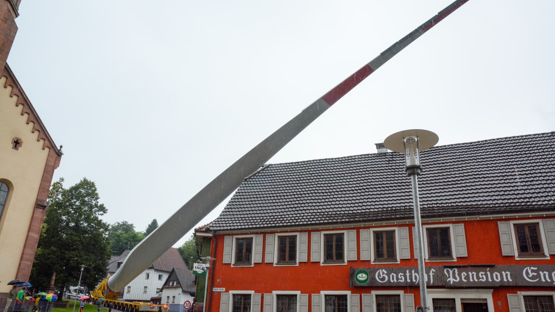As the components of wind turbines get bigger, logistical challenges faced by the sector also look set to grow. This image, from August 2021, shows a 69-meter long rotor blade being transported in Germany.