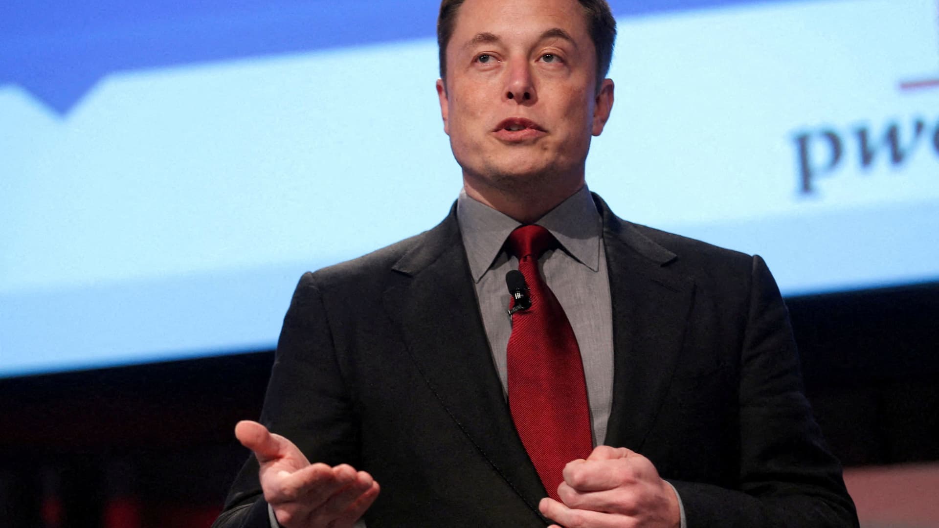 Elon Musk talks at the Automotive World News Congress at the Renaissance Center in Detroit, Michigan.