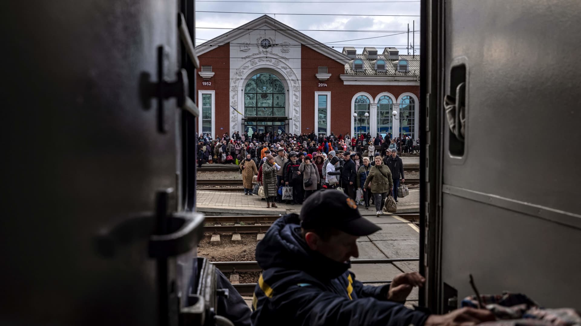 Families have been seen queuing for days outside the train station in Kramatorsk.