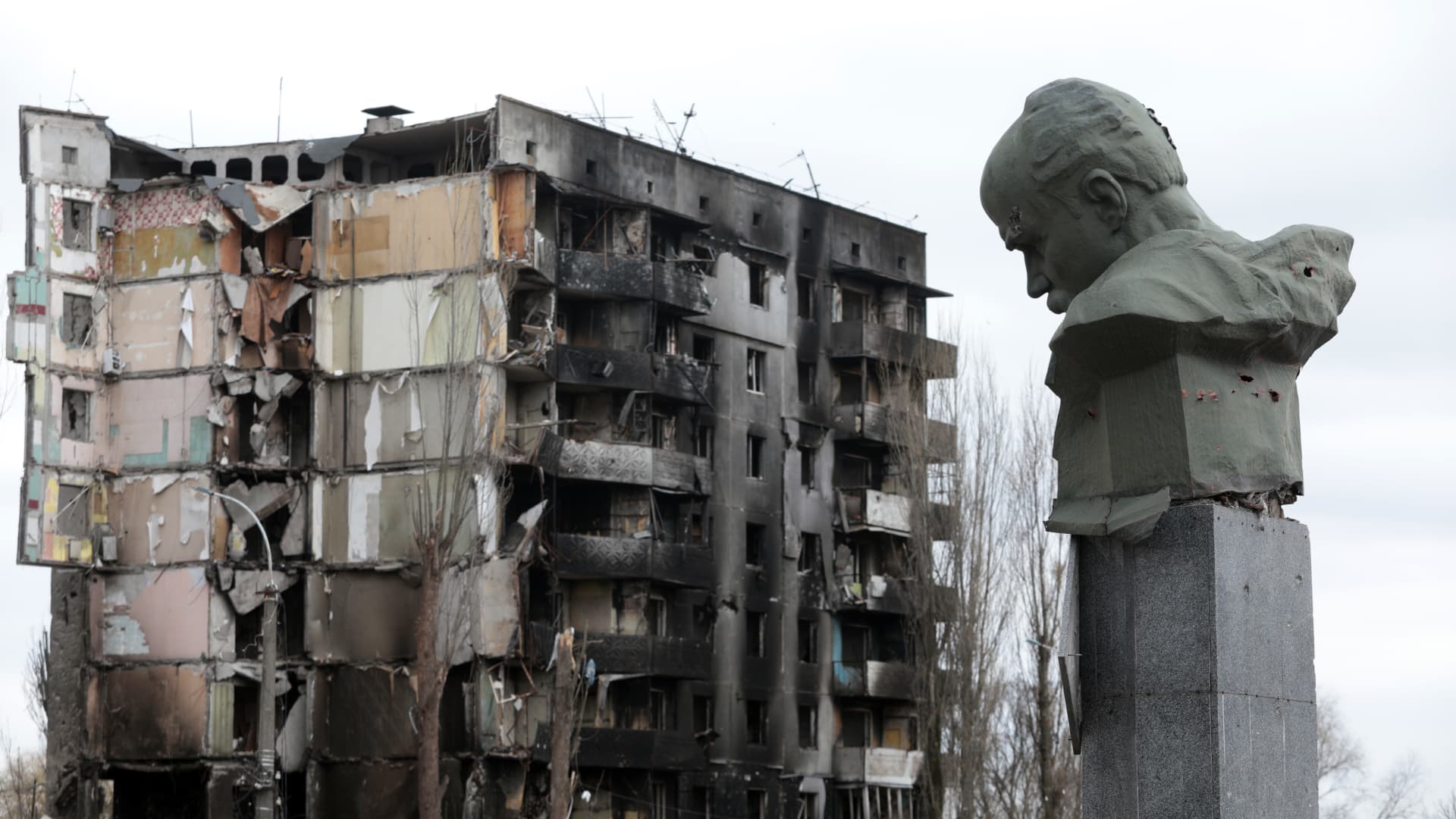 A monument to Taras Shevchenko is seen near a residential building destroyed by the russian army shelling in Borodyanka, Kyiv Region, north-central Ukraine.