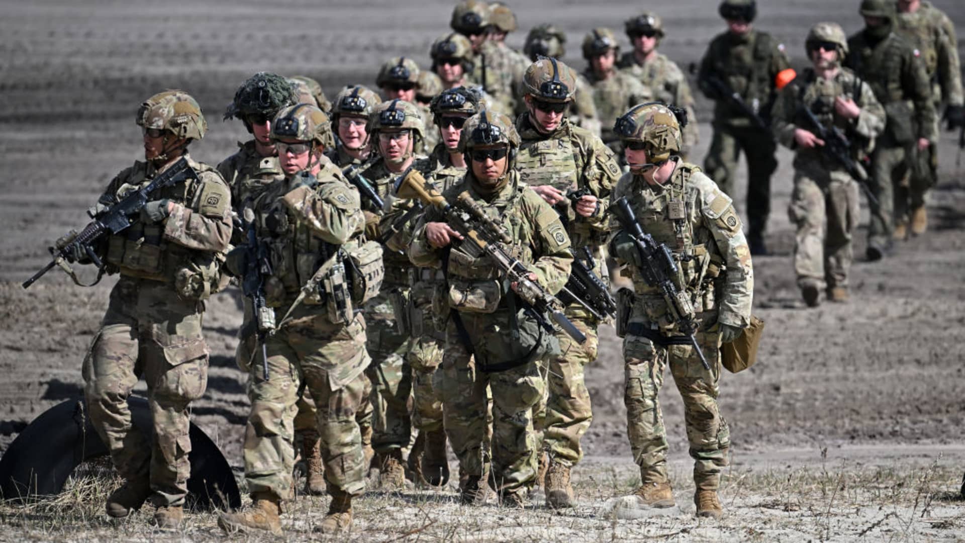Troops from the Polish 18th Mechanised Division and the 82nd Airborne Division (USA) take part in tactical and fire training on April 8, 2022 in Nowa Deba, Poland. 