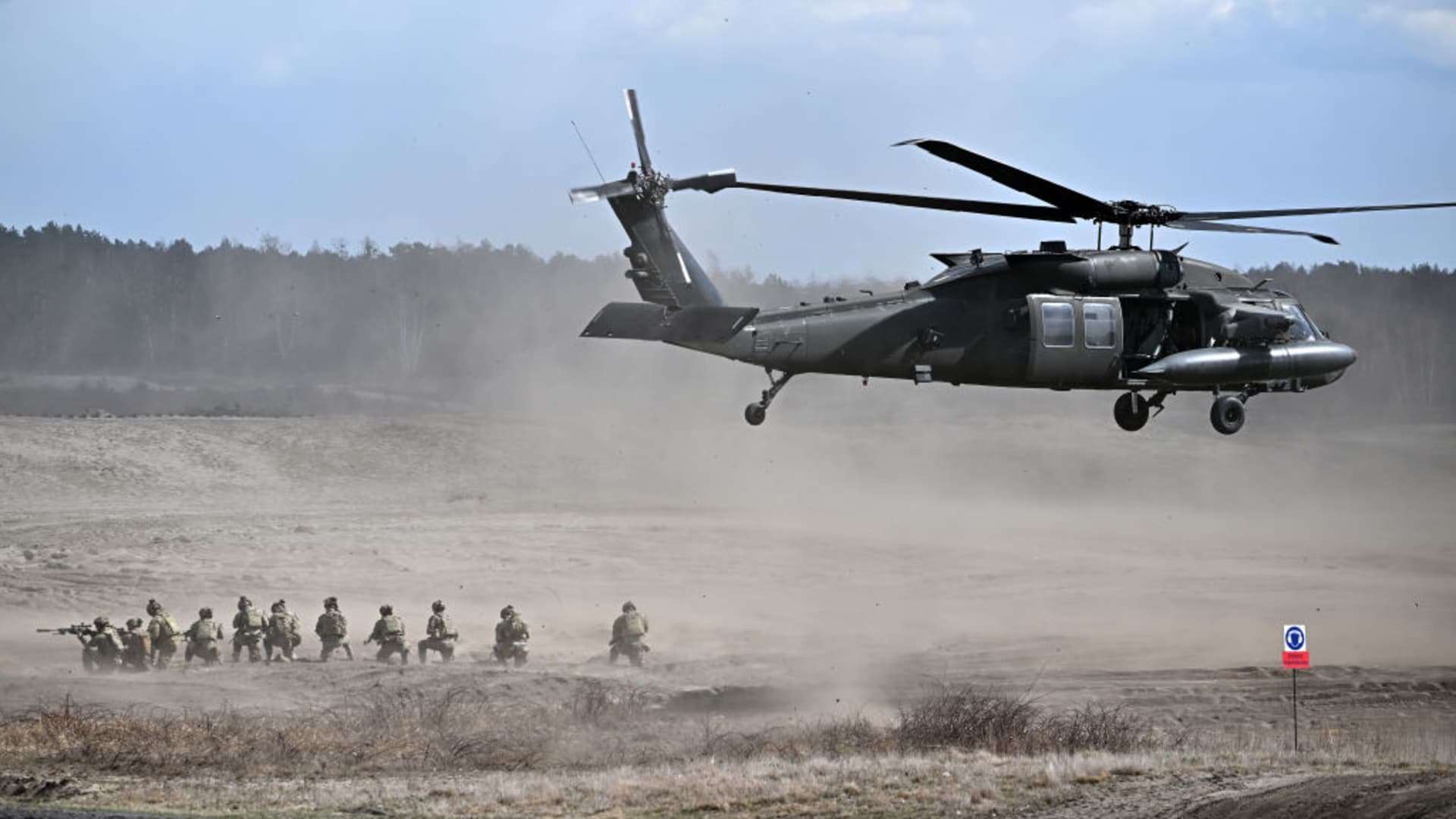 Troops from the Polish 18th Mechanised Division and the 82nd Airborne Division (USA) take part in tactical and fire training on April 8, 2022 in Nowa Deba, Poland.