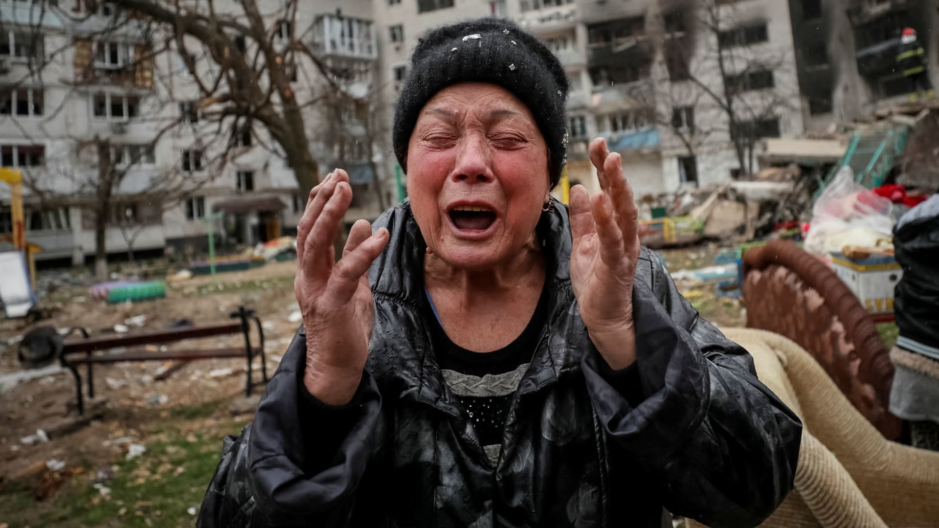 Mariya, 77, whose daughter and son-in-law died under the rubble of a building destroyed by Russian shelling, cries, amid Russia's invasion on Ukraine in Borodyanka, in Kyiv region, Ukraine April 8, 2022.