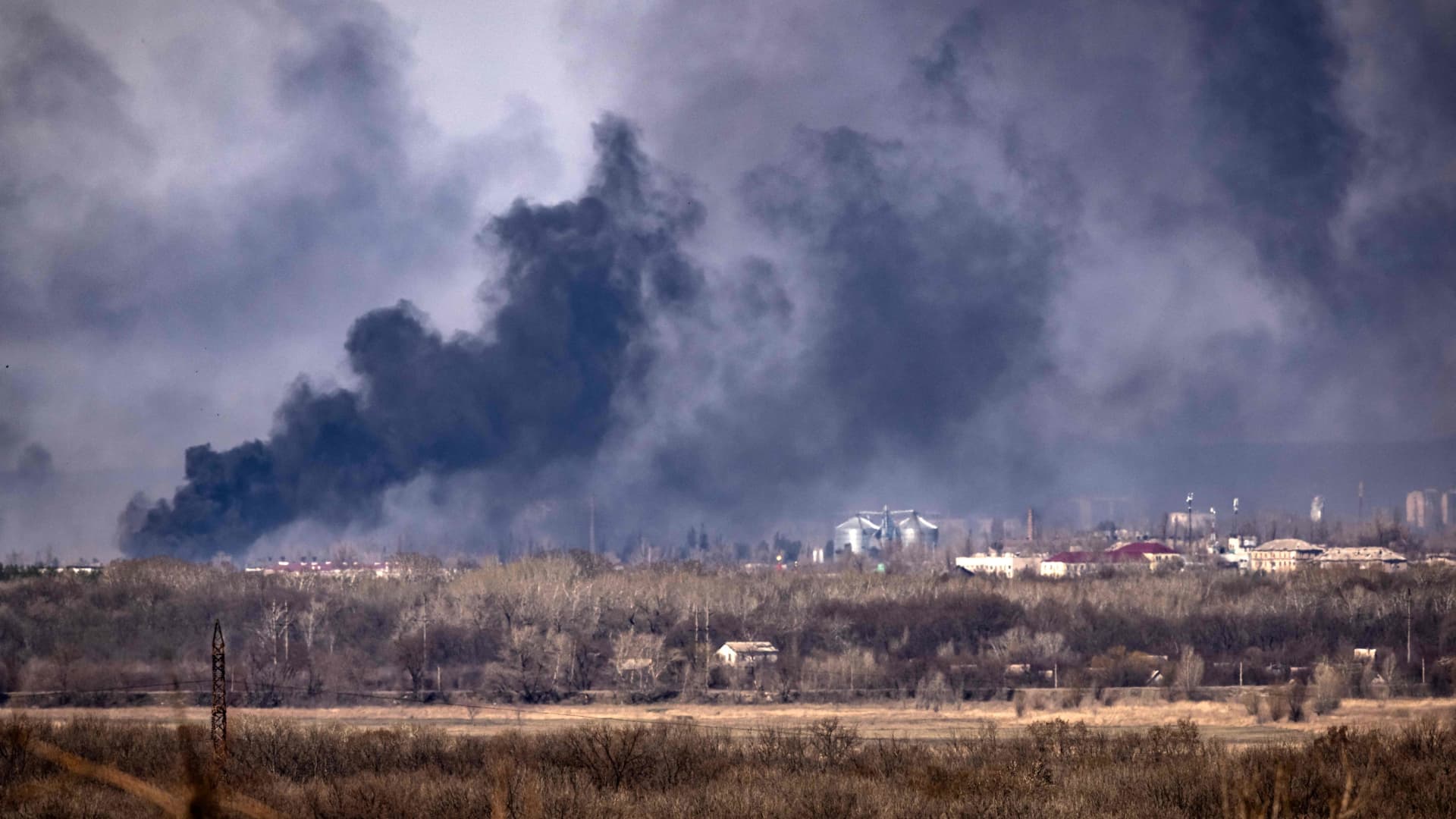 Smoke rises over the town of Rubizhne, Donbas region, on April 7, 2022, amid Russia's military invasion launched on Ukraine.