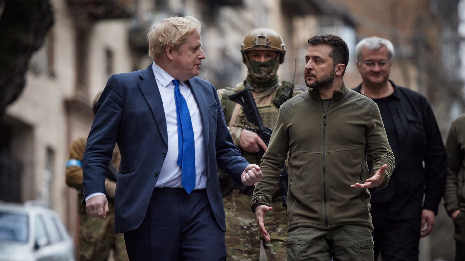 Ukraine's President Volodymyr Zelenskyy and British Prime Minister Boris Johnson walk at the Independence Square after a meeting, as Russia's attack on Ukraine continues, in Kyiv, Ukraine April 9, 2022.