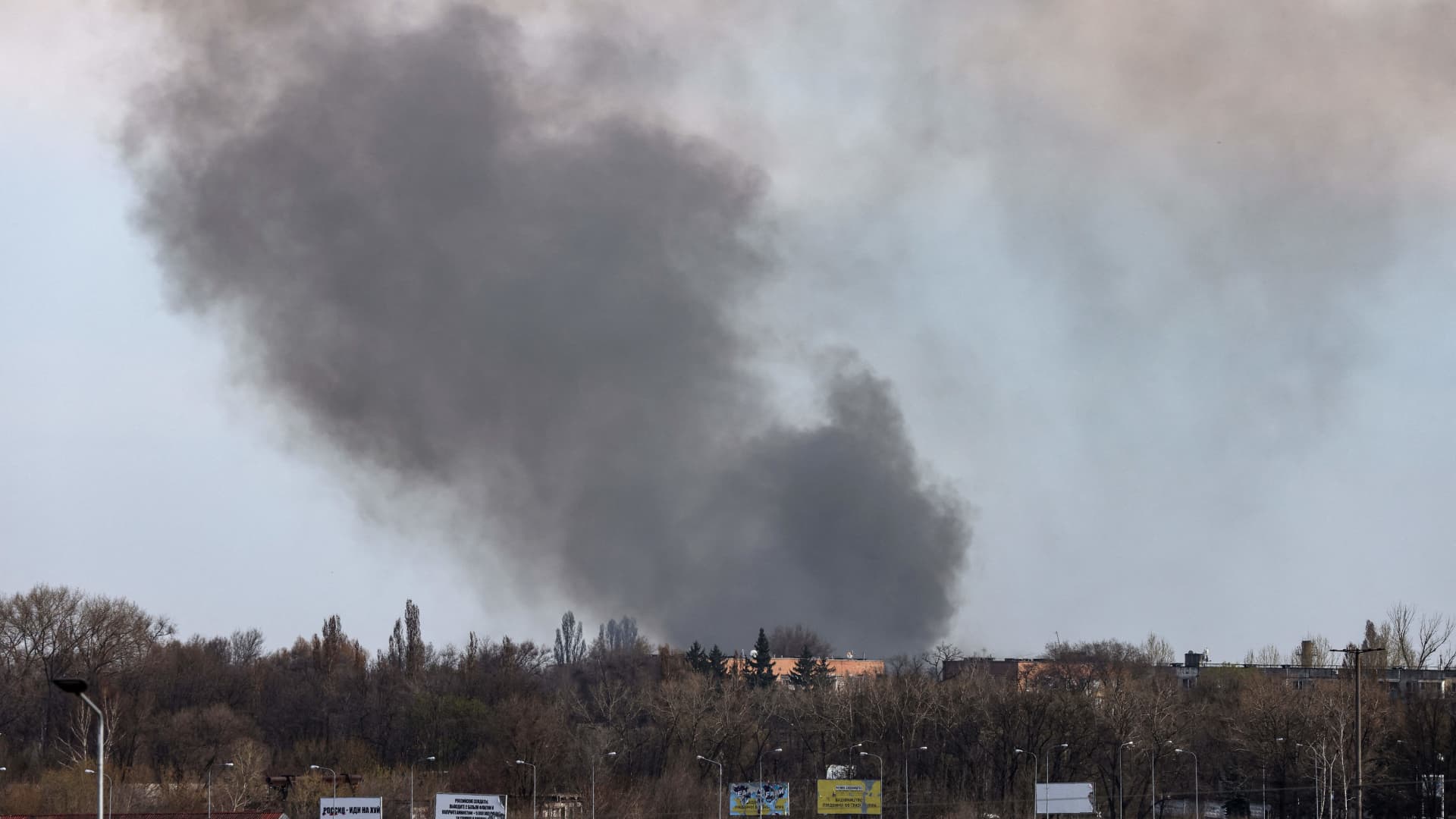 Smoke rises from the airport of Dnipro, on April 10, 2022.