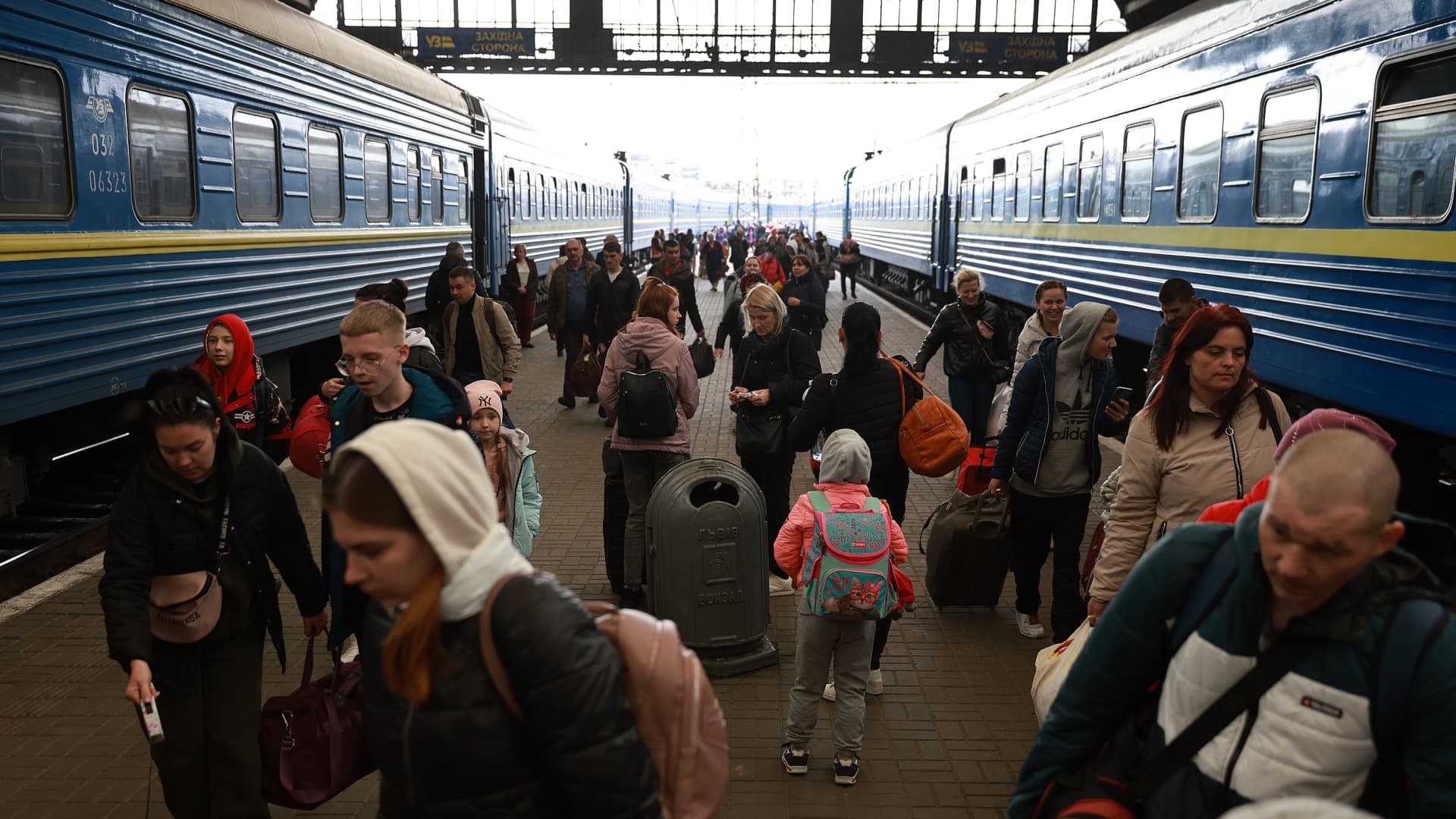 People arrive at the central train station from Pokrovsk, in the eastern part of Ukraine on April 11, 2022 in Lviv, Ukraine.